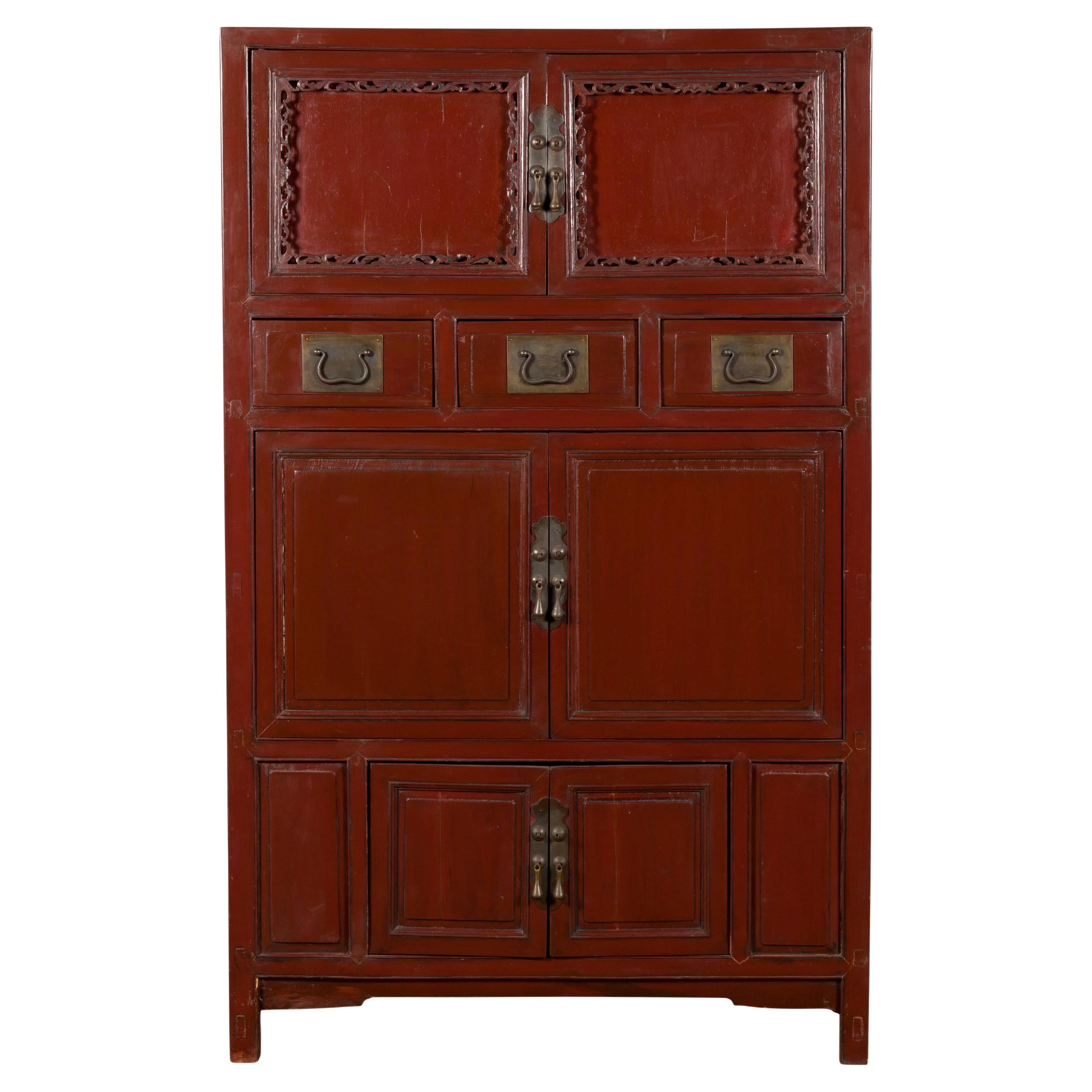 Mid-19th Century Chinese Qing Red Lacquer Cabinet with Multiple Carved Doors For Sale