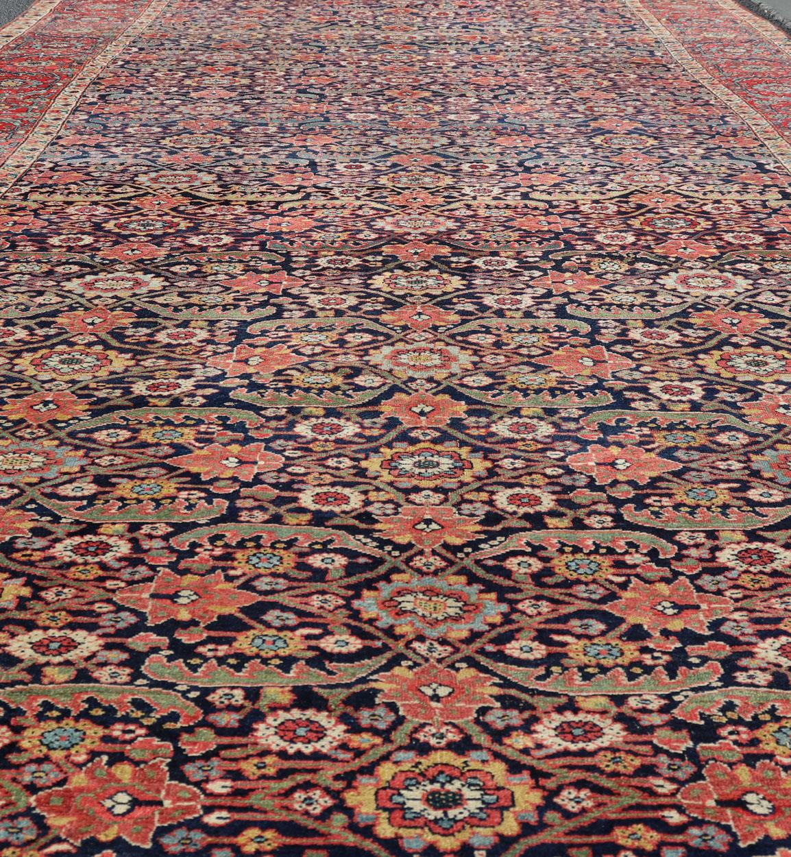 1850 antique Persian Joshegan large gallery rug in blue background, soft red border. 

Measures: 7'4 x 19'0 
 
From the estate of Jack Welch, the American Executive, this circa 1850 Mid-19th Century, antique Joshegan long gallery rug displays
