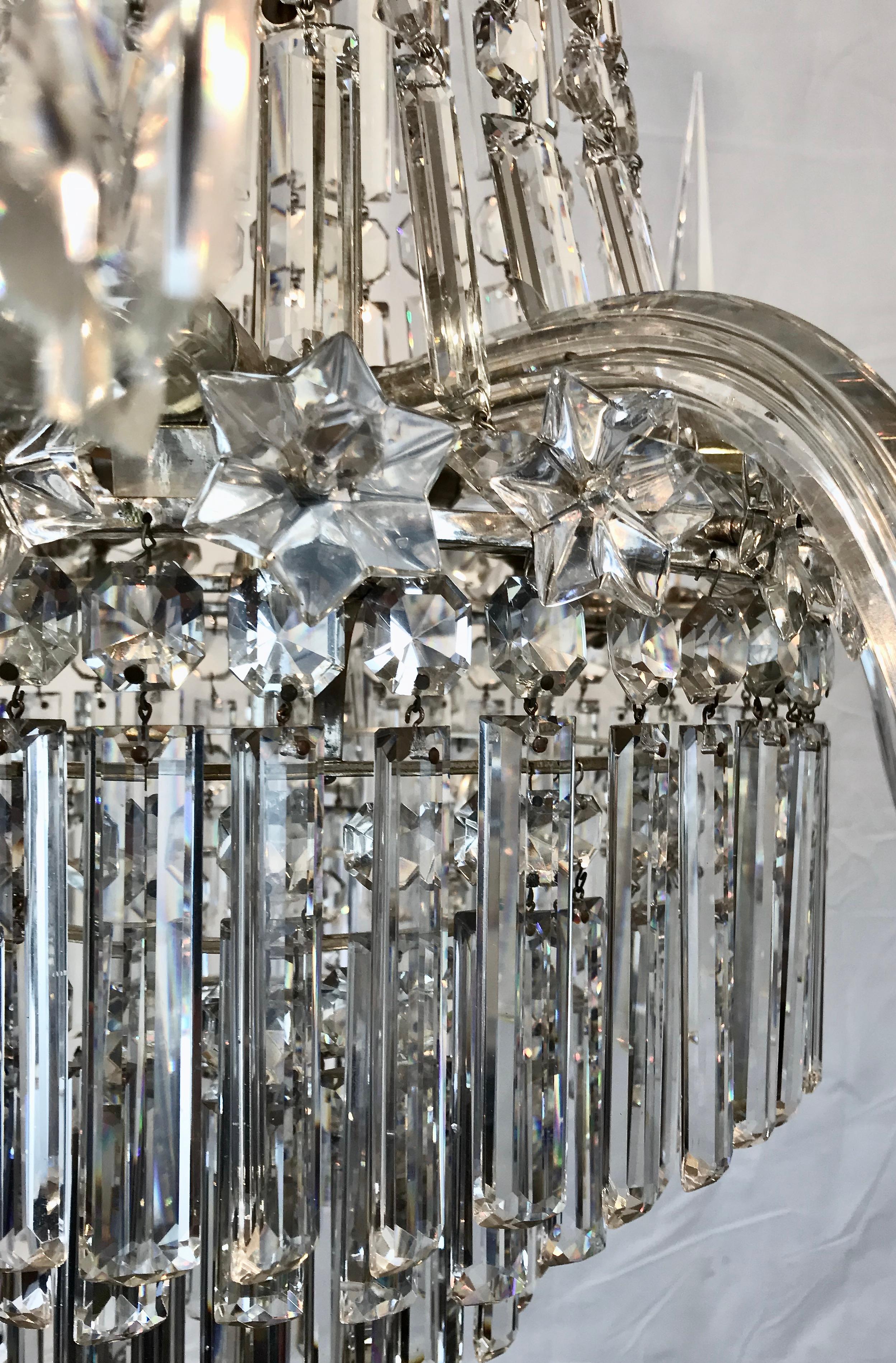 This signed F. & C. Osler chandelier of Classic tent and waterfall design is of the finest quality, featuring lapidary or 