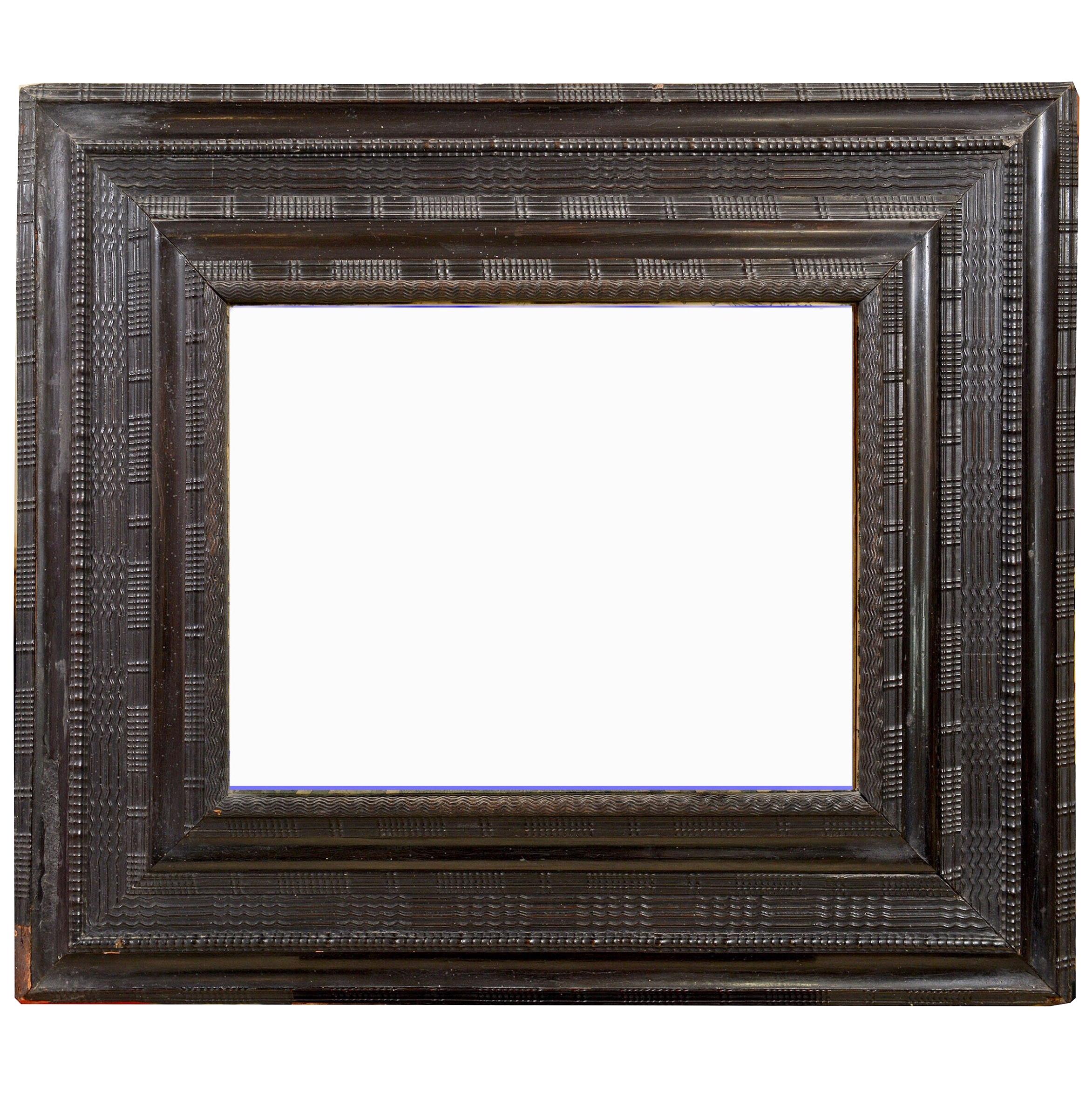 Mid 19th century Dutch ebonised ripple frame of large proportions For Sale