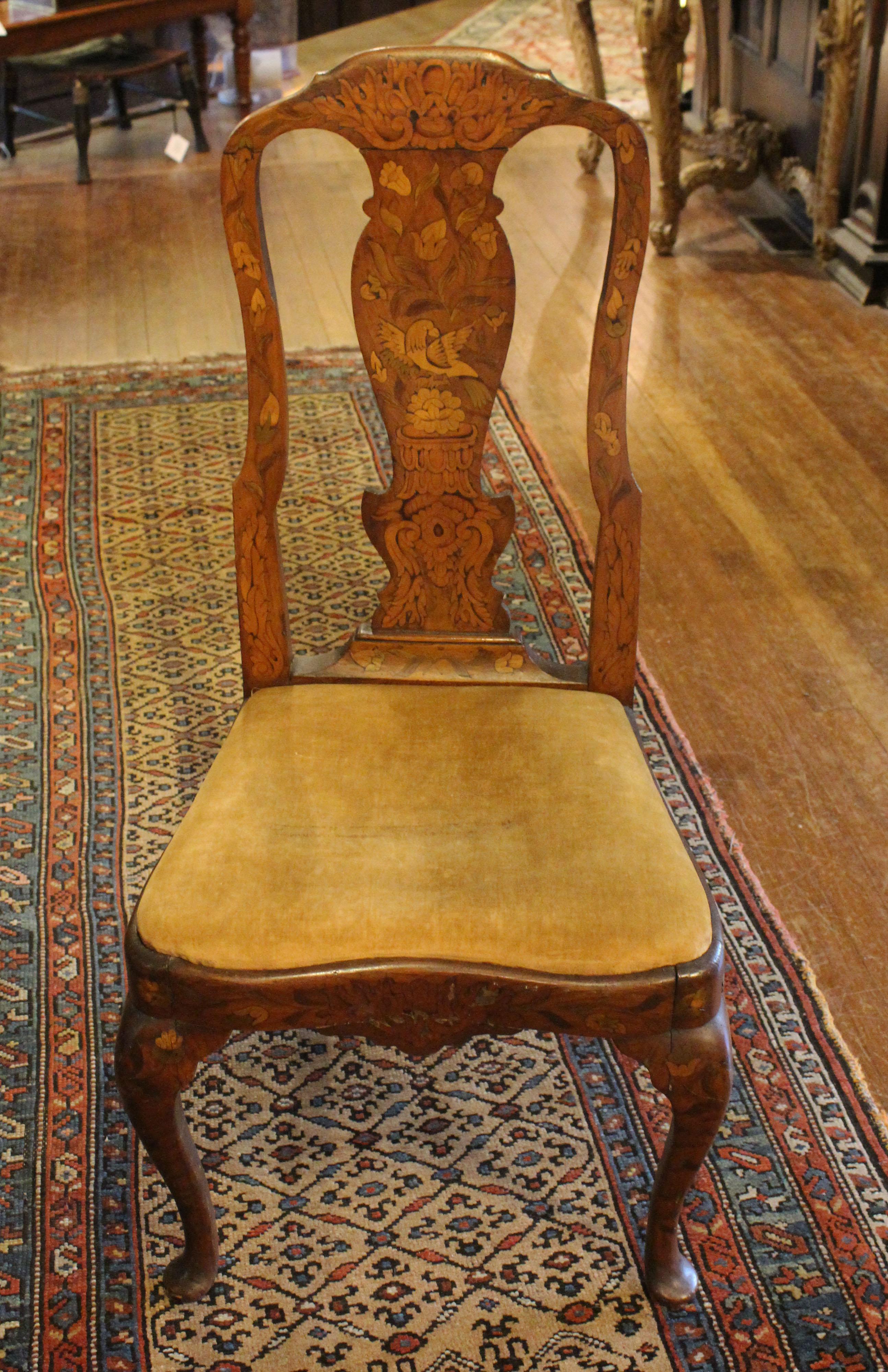 Mid-19th century marquetry inlaid side chair, Dutch. Walnut & oak with extensive marquetry of birds & flowers in the mid-18th century taste. Typical small marquetry losses. Provenance: Katharine Reid former director of the Cleveland Museum of Art.