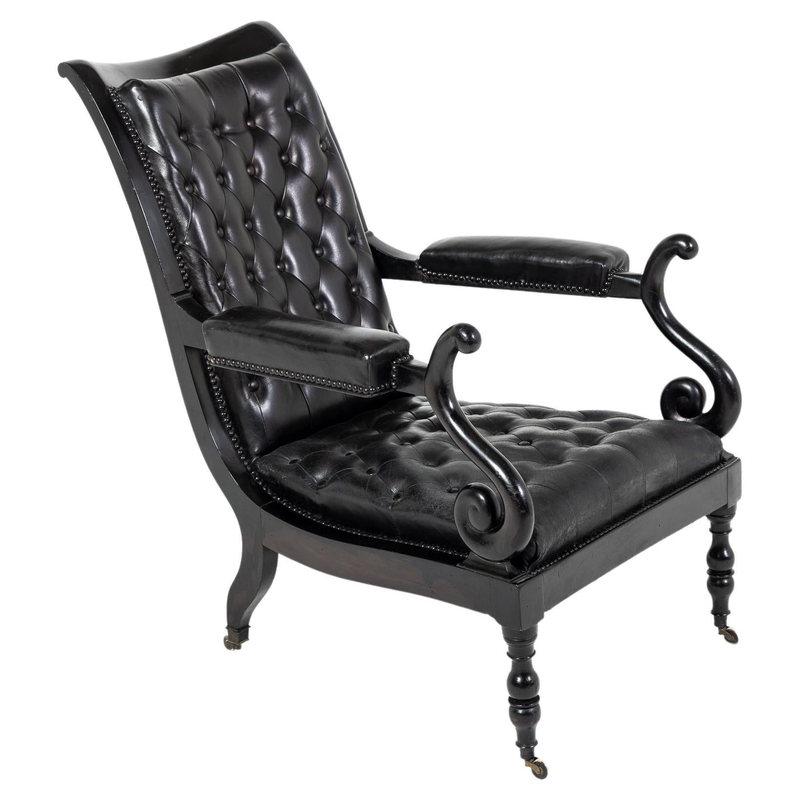 Mid 19th Century Ebonised and Leather Library Armchair For Sale