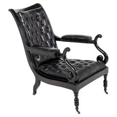 Antique Mid 19th Century Ebonised and Leather Library Armchair