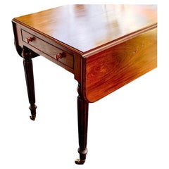 Mid-19th Century English Carved Mahogany Drop Leaf Pembroke Table