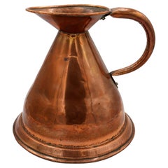 Jarra medidora inglesa de pajar de cobre de mediados del siglo XIX