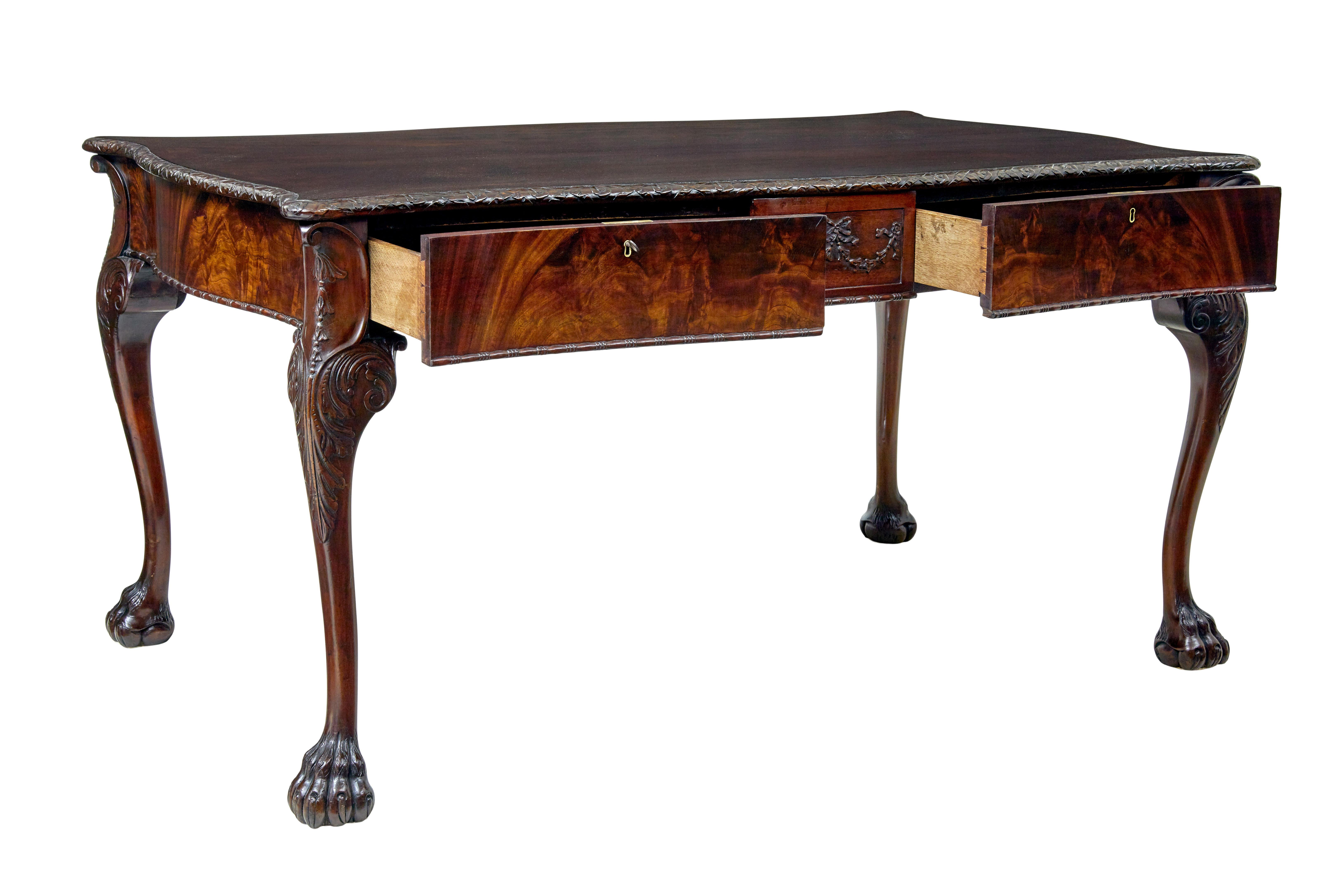 19th century English carved desk in the chippendale taste circa 1860.

Here we have a fine quality chippendale inspired desk, not to be confused with numerous modern reproductions or made to order examples

Serpentine shaped on all 4 sides and