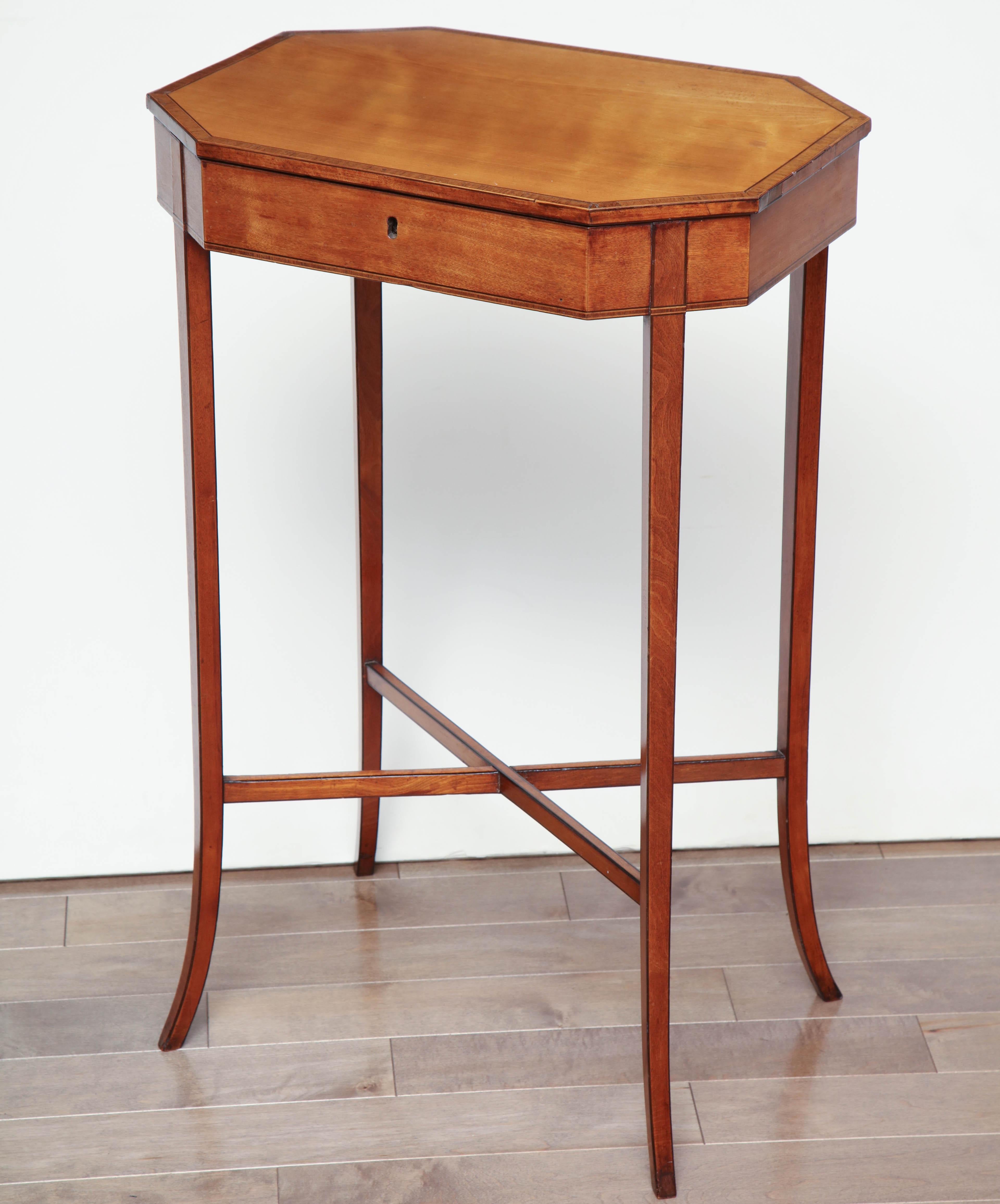 Mid-19th century English, Sheraton style, satinwood side table with top that opens, no drawer.