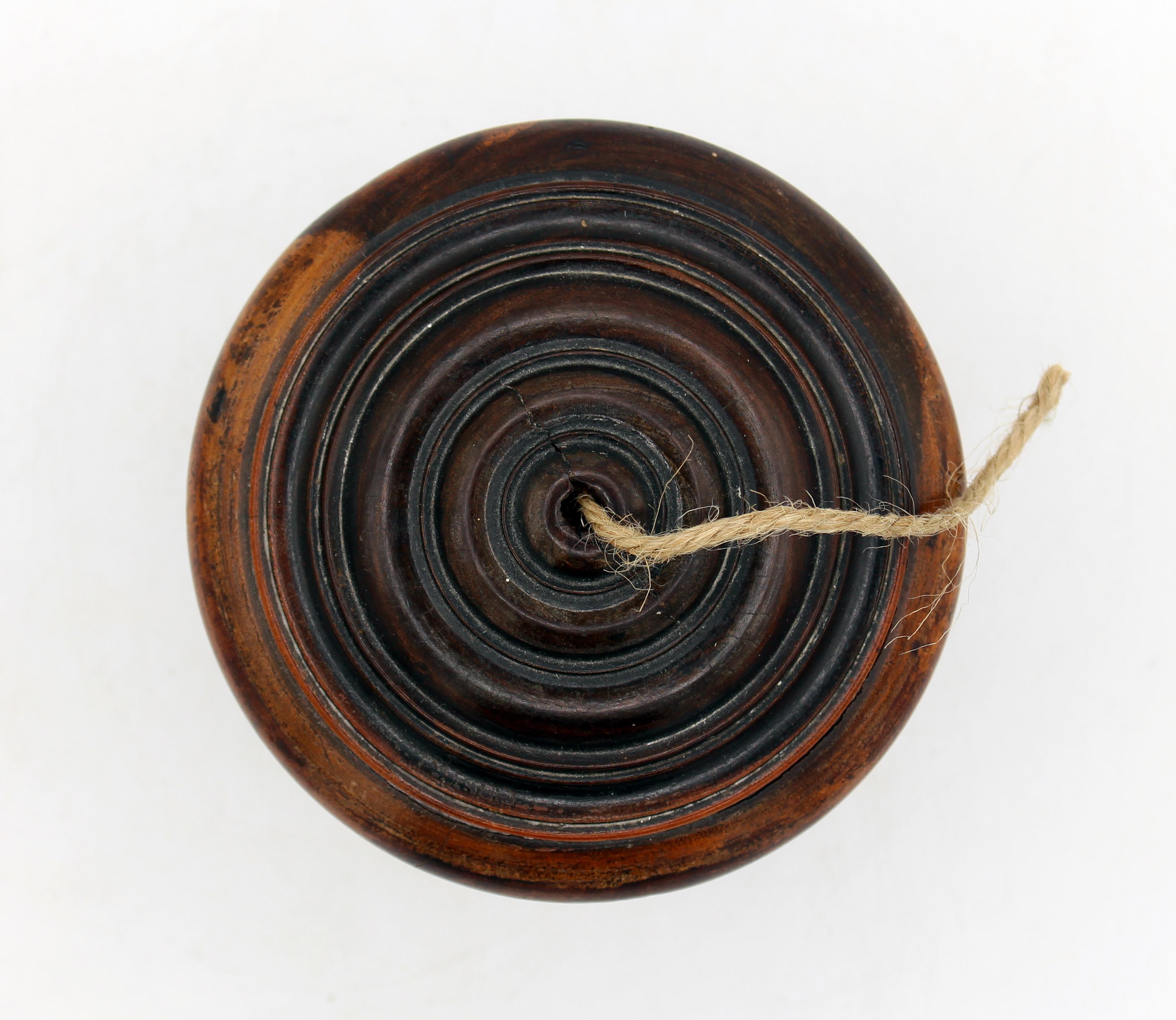 Mid-19th century turned & carved treen twine holder box, English. Made of lignum vitae. The container & lid & base separately turned & screw together - the 