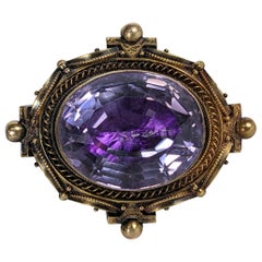 Mid 19th Century Foiled Amythest Etruscan Brooch