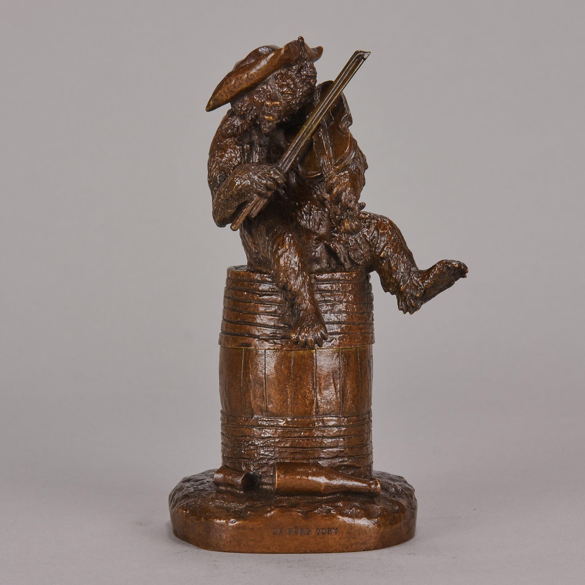 Exquisite mid 19th century French bronze study of an anthropomorphic bear sitting on a barrel playing a violin, the barrel can be opened halfway to form a container. The surface with excellent mid to dark brown patina and very fine hand chased