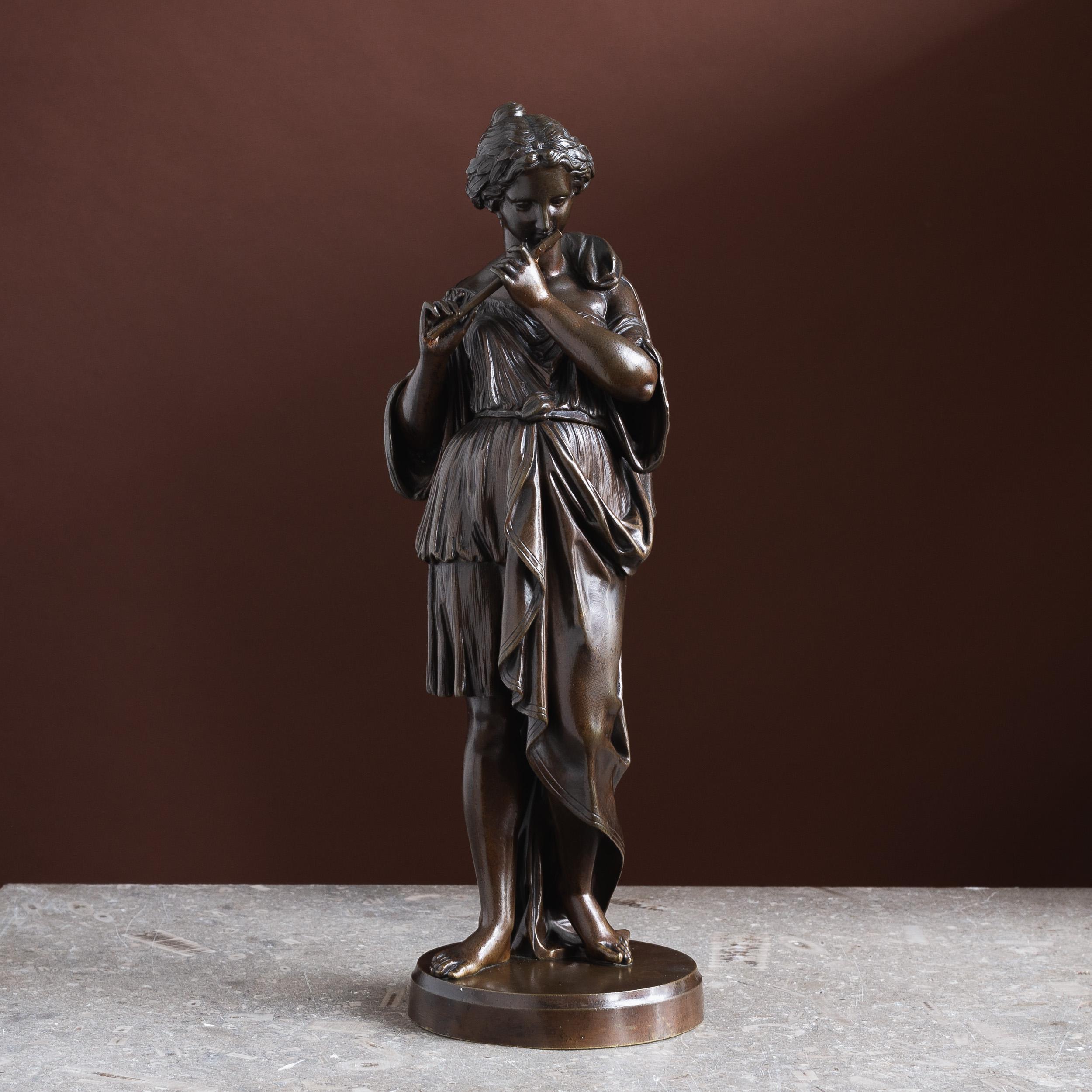 A French Bronze of Euterpe, the Greek muse of music and lyric poetry, mid-nineteenth century.

