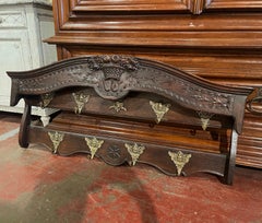 19th Century French Louis XV Carved Walnut Panetiere with Cherub Hooks