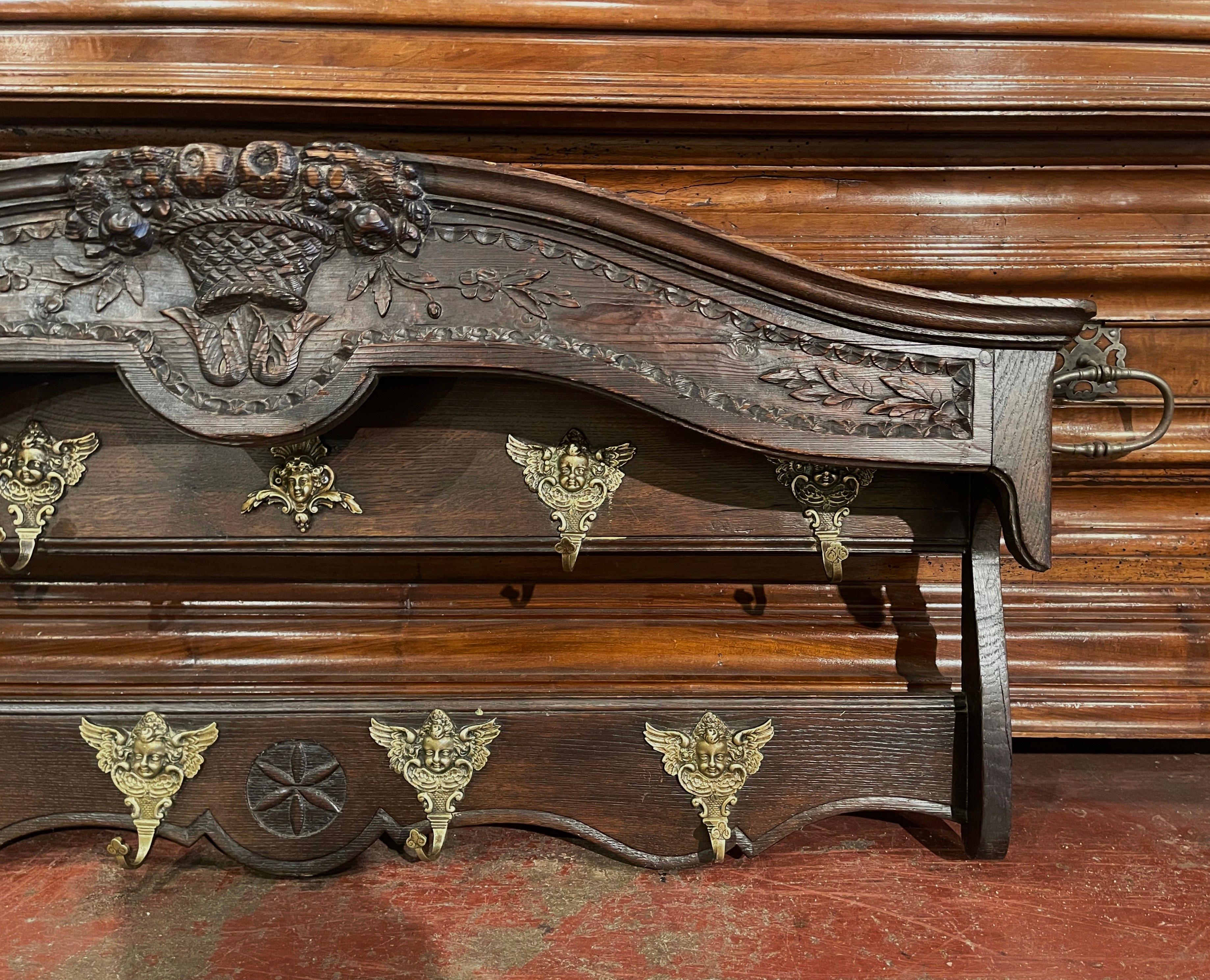 Mid-19th Century French Carved Oak Hanging Shelf with Hooks from Normandy In Excellent Condition For Sale In Dallas, TX