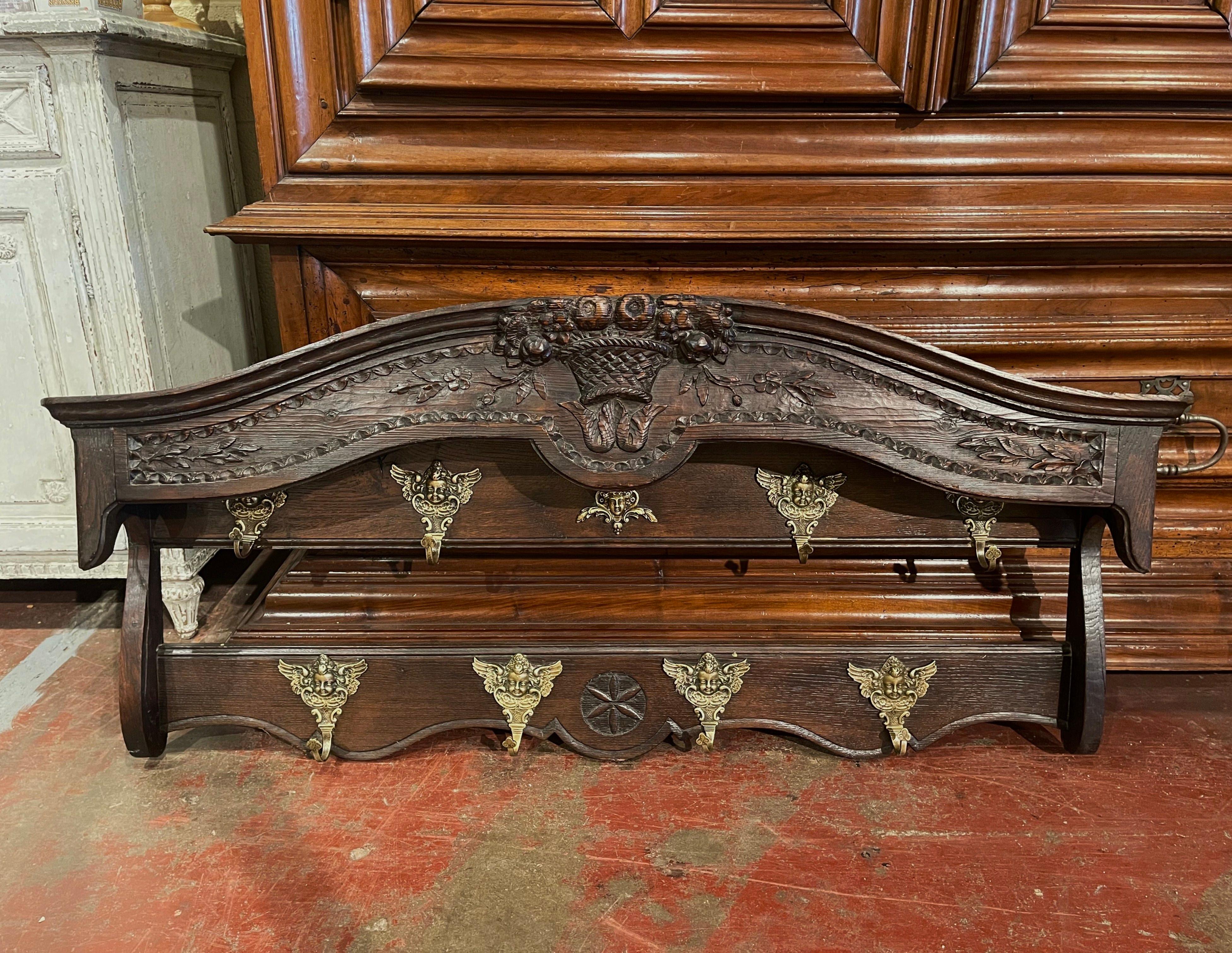 Bronze Mid-19th Century French Carved Oak Hanging Shelf with Hooks from Normandy For Sale