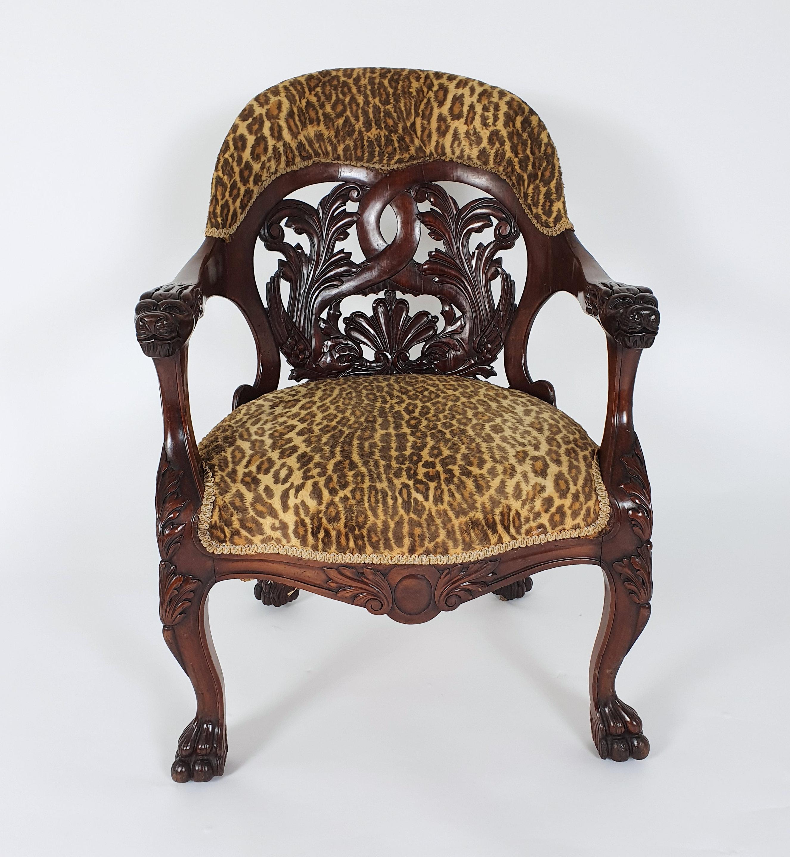 A mid-19th century French carved walnut desk chair with a horseshoe shaped back decorated with stylised dolphins. This gorgeous chair stands on carved paw feet with the original castors. It measures 26 ½ in – 67.3 cm wide, 23 ½ in – 59.7 cm deep and