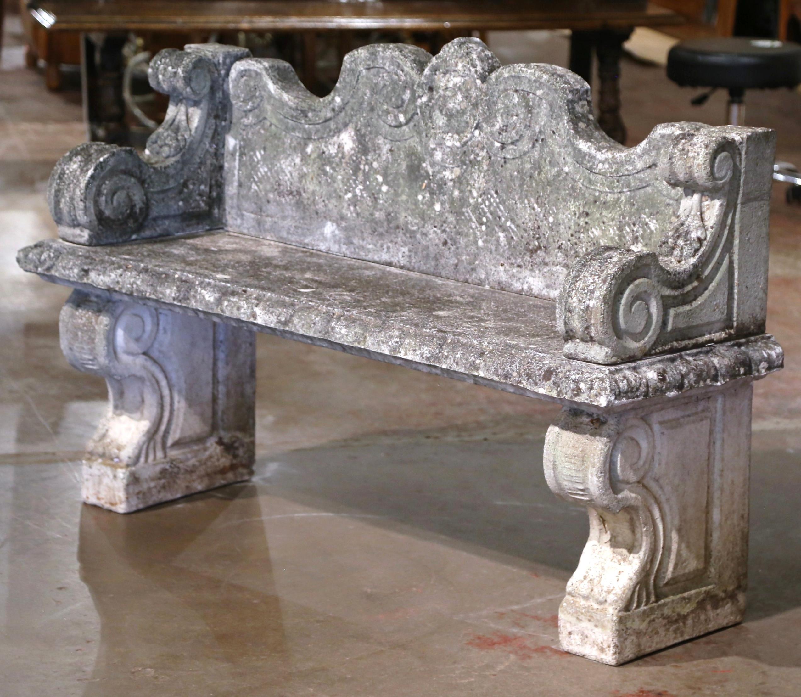 Decorate a garden or a patio with this elegant antique stone bench. Carved in Normandy France circa 1860 and built in six separate sections, the outdoor bench stands on dual carved baluster-form bases over a rectangular seat decorated with incised