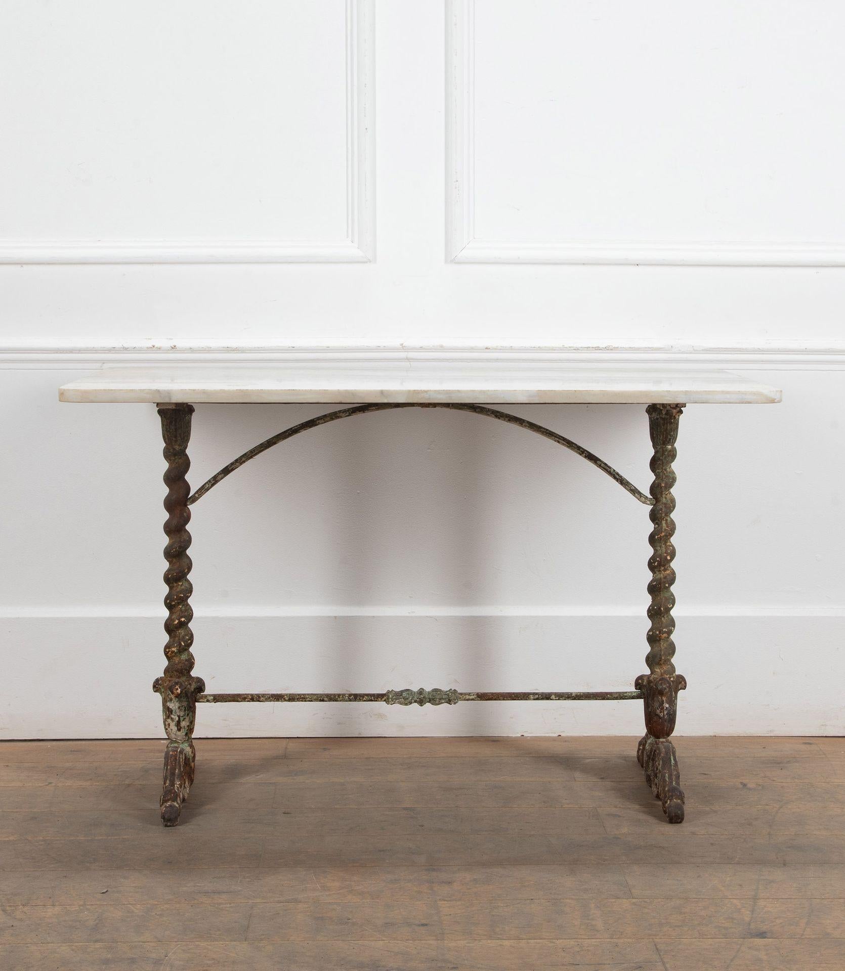 Versatile mid-19th Century French cast iron and marble garden table.
Would also make a great console or centre table indoors.