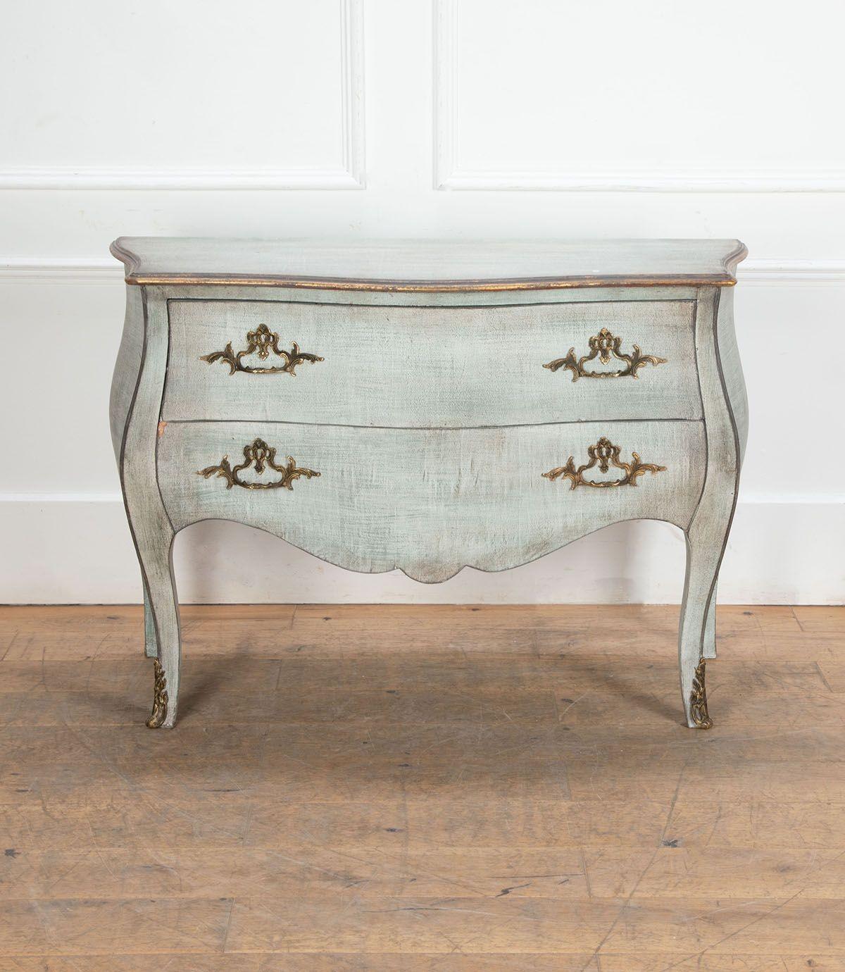 Decorative mid-19th Century French commode with later paint. 
With original hardware throughout.