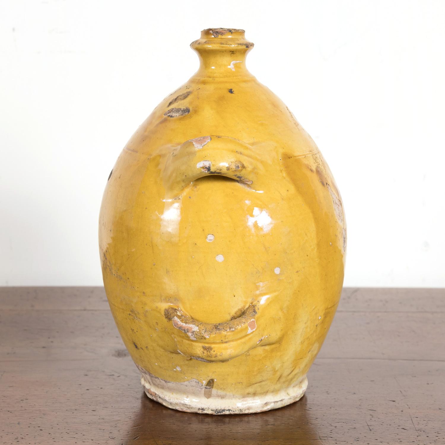 Terracotta Mid-19th Century French Conscience Water or Olive Oil Jug with Yellow Glaze