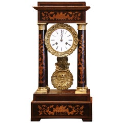 Mid-19th Century French Empire Carved Walnut and Marquetry Portico Mantel Clock