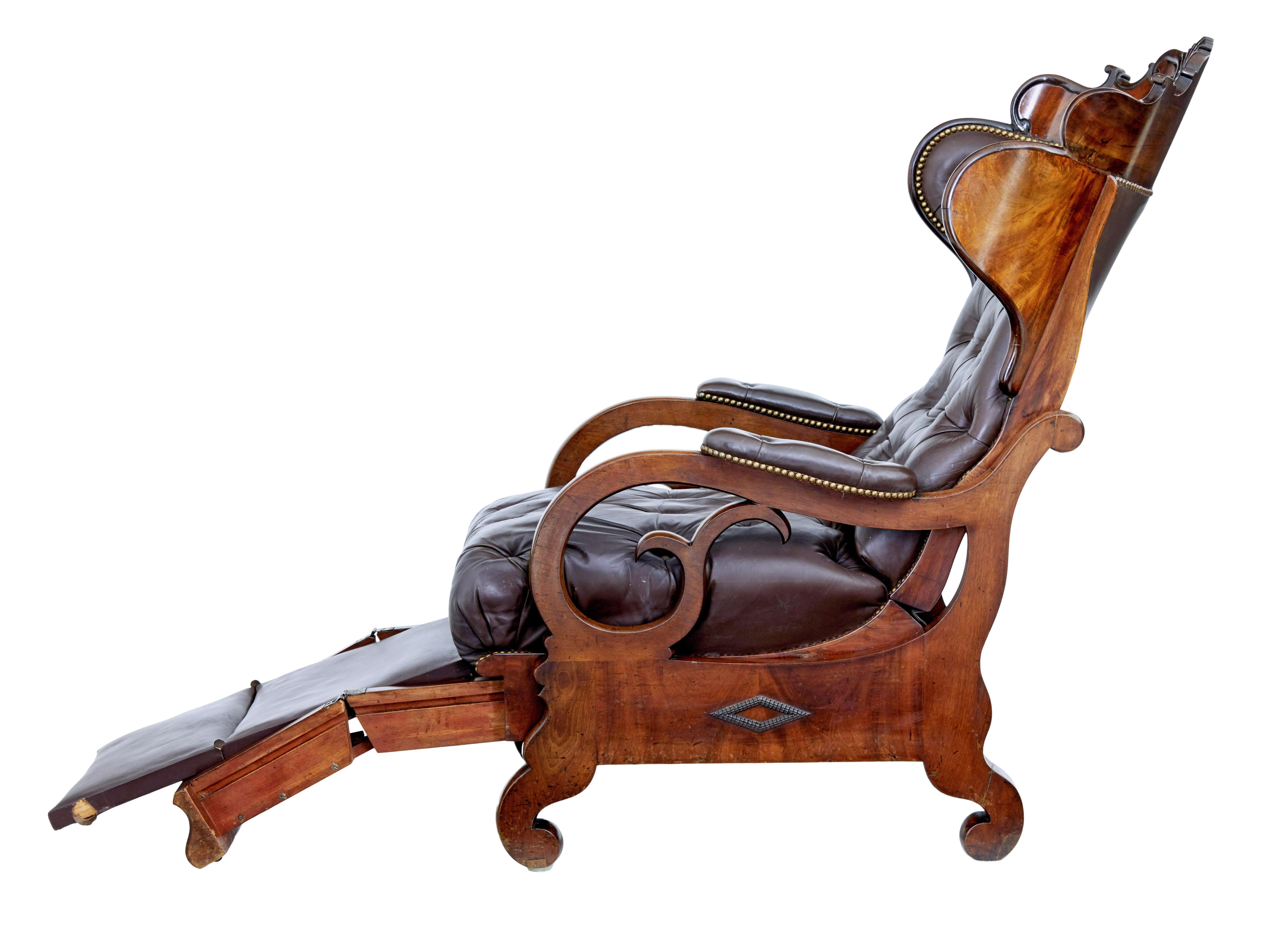 Leather Mid 19th century French empire mahogany and leather reclining chair For Sale