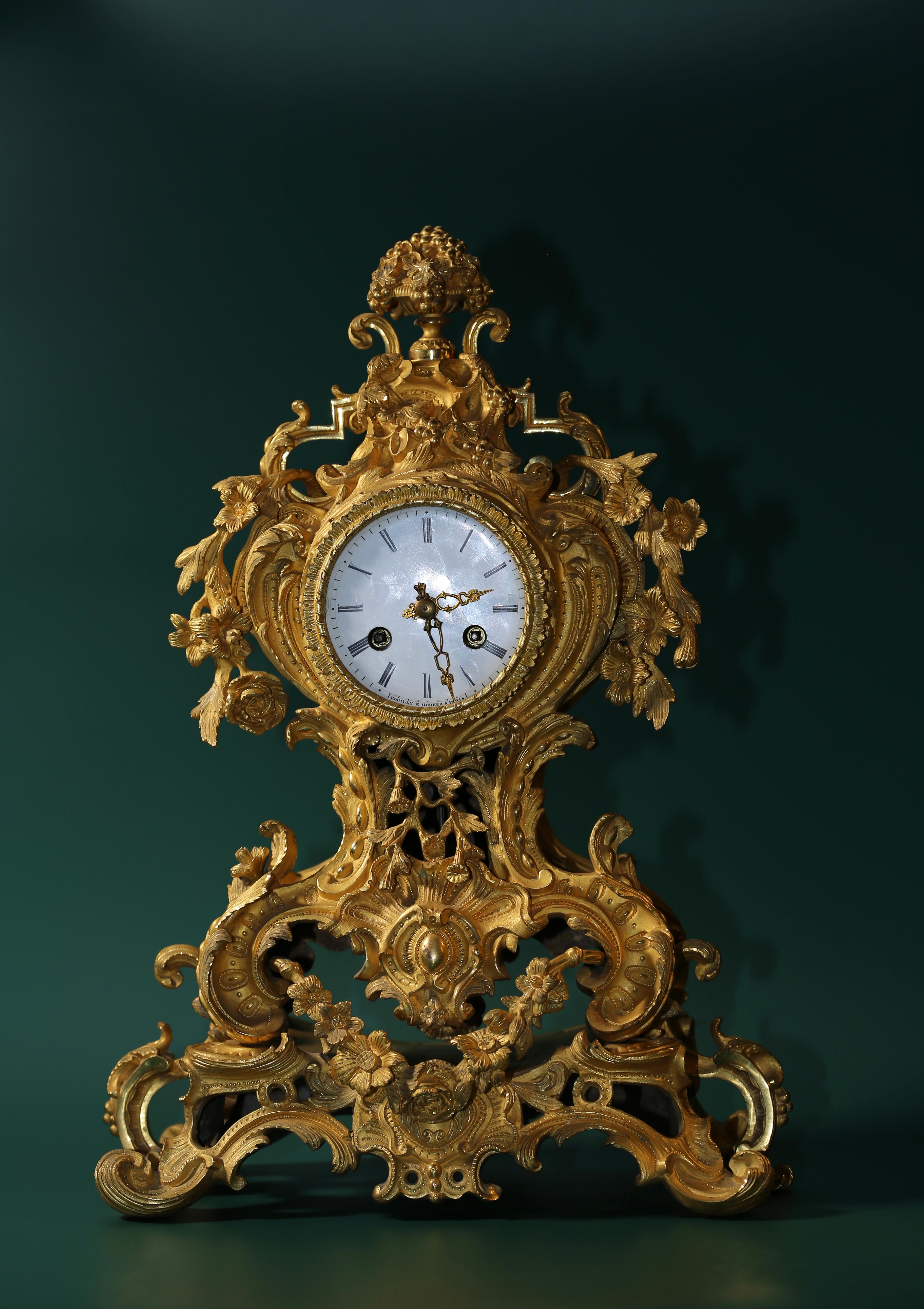 Measures: 3 4/5 inch/ 350mm High

Made in France, Mid 19th century, Gilt Bronze Rococo style standing clock in perfect condition, functions well

This magnificent 19th century masterpiece was proudly obtained by Redstone Antiques in 2011 from a