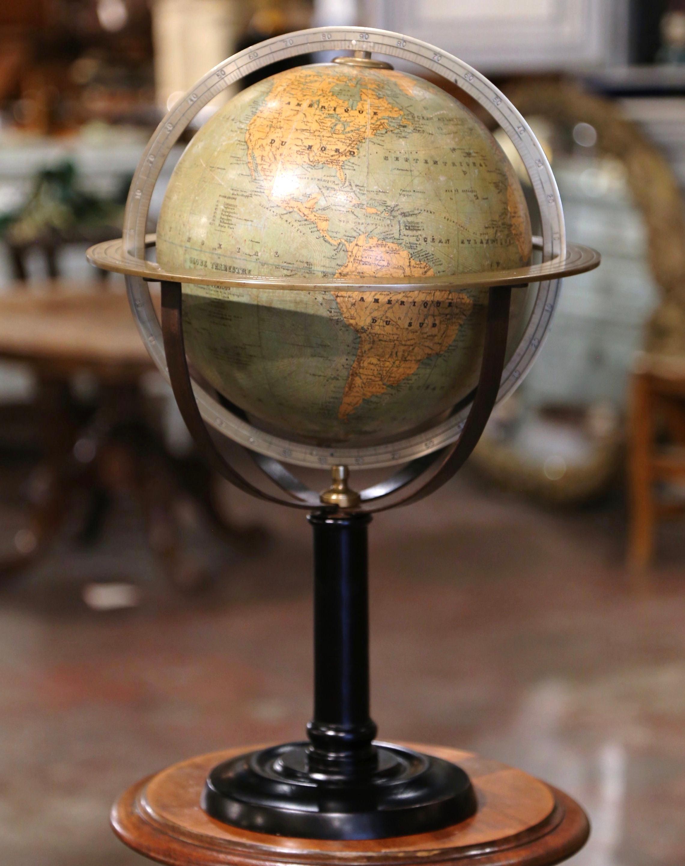 Decorate an office or a desk with this beautifully preserved antique terrestrial globe. Crafted in France, circa 1870, the terrestrial piece sits on a Napoleon III walnut pedestal base. The brass stem holds the 12