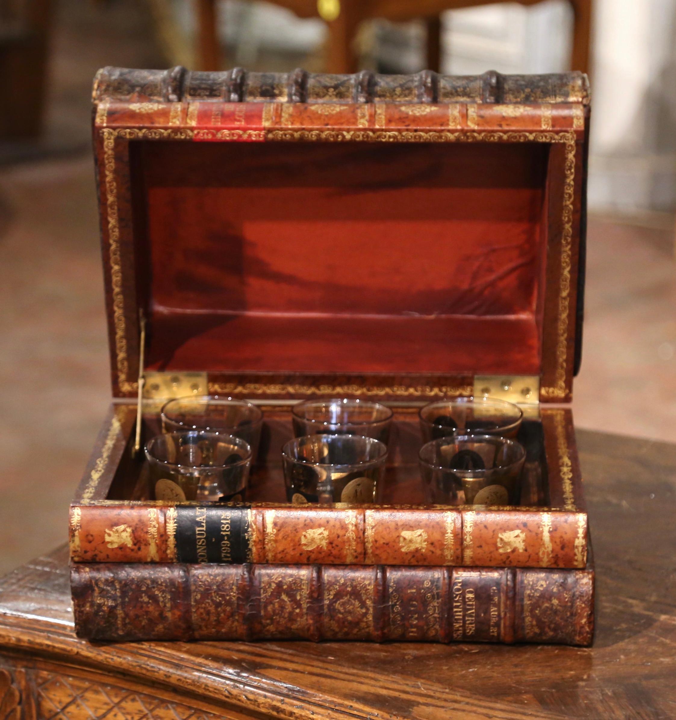 For a interesting bar accessory, look no further than this colorful antique Faux-book 