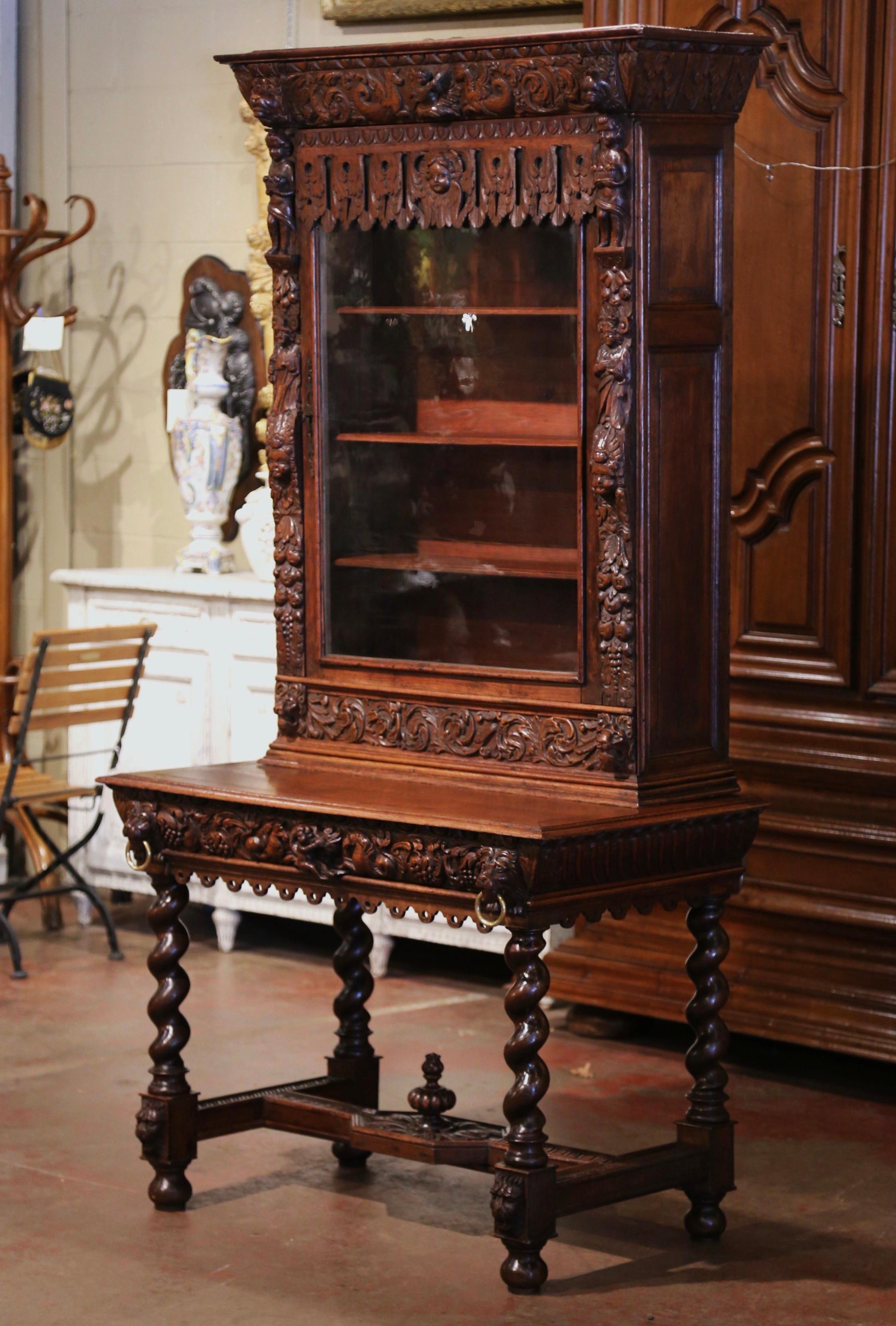 Decorate a man's office or study this this stunning Henri II two-piece antique desk cabinet. Crafted in southern France circa 1860 and built of oak, the table stands on elegant barley twist legs ending in ball feet, and joined by a bottom H