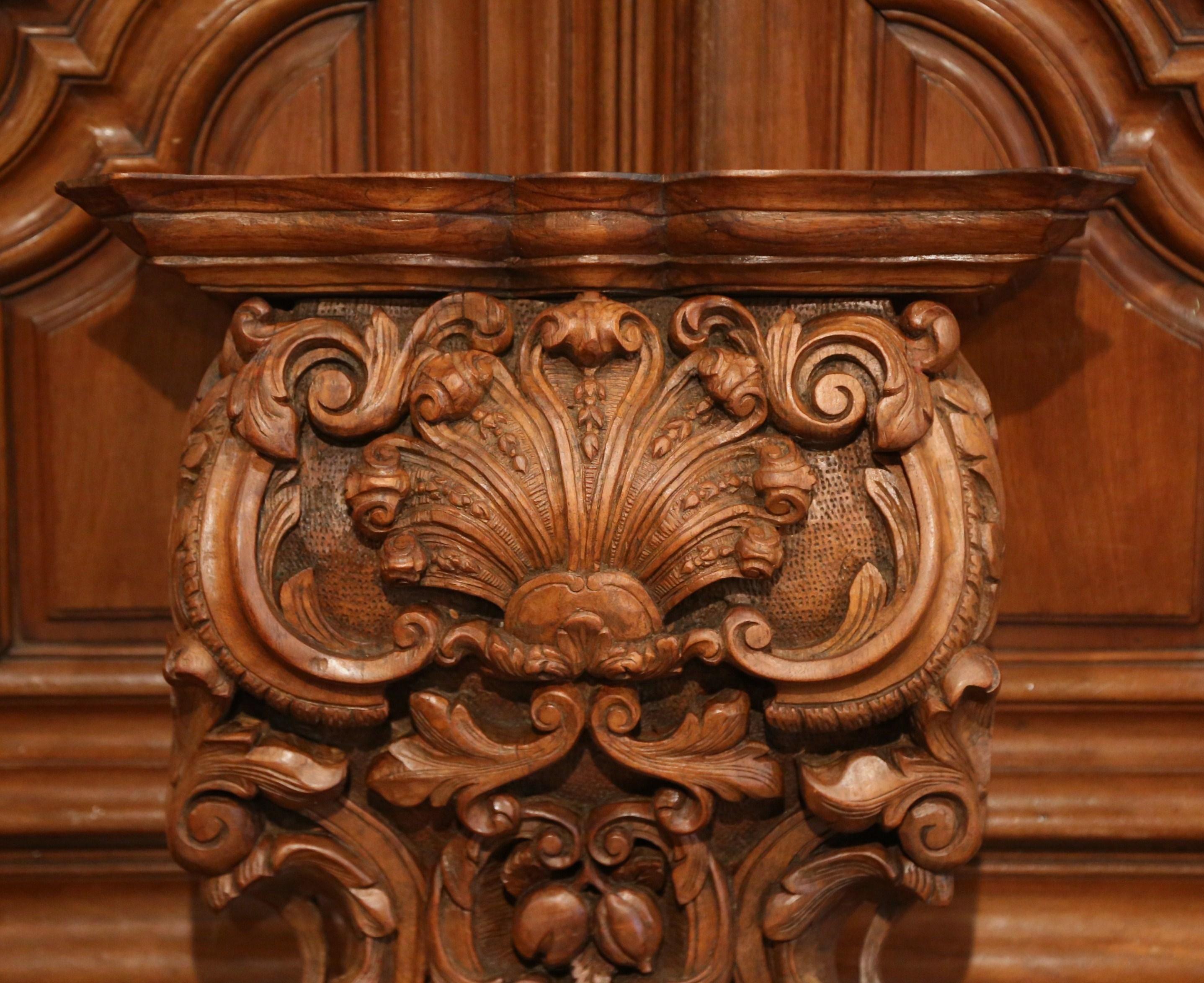 Patinated Mid-19th Century French Louis XIV Carved Walnut Wall Bracket with Shell Motif