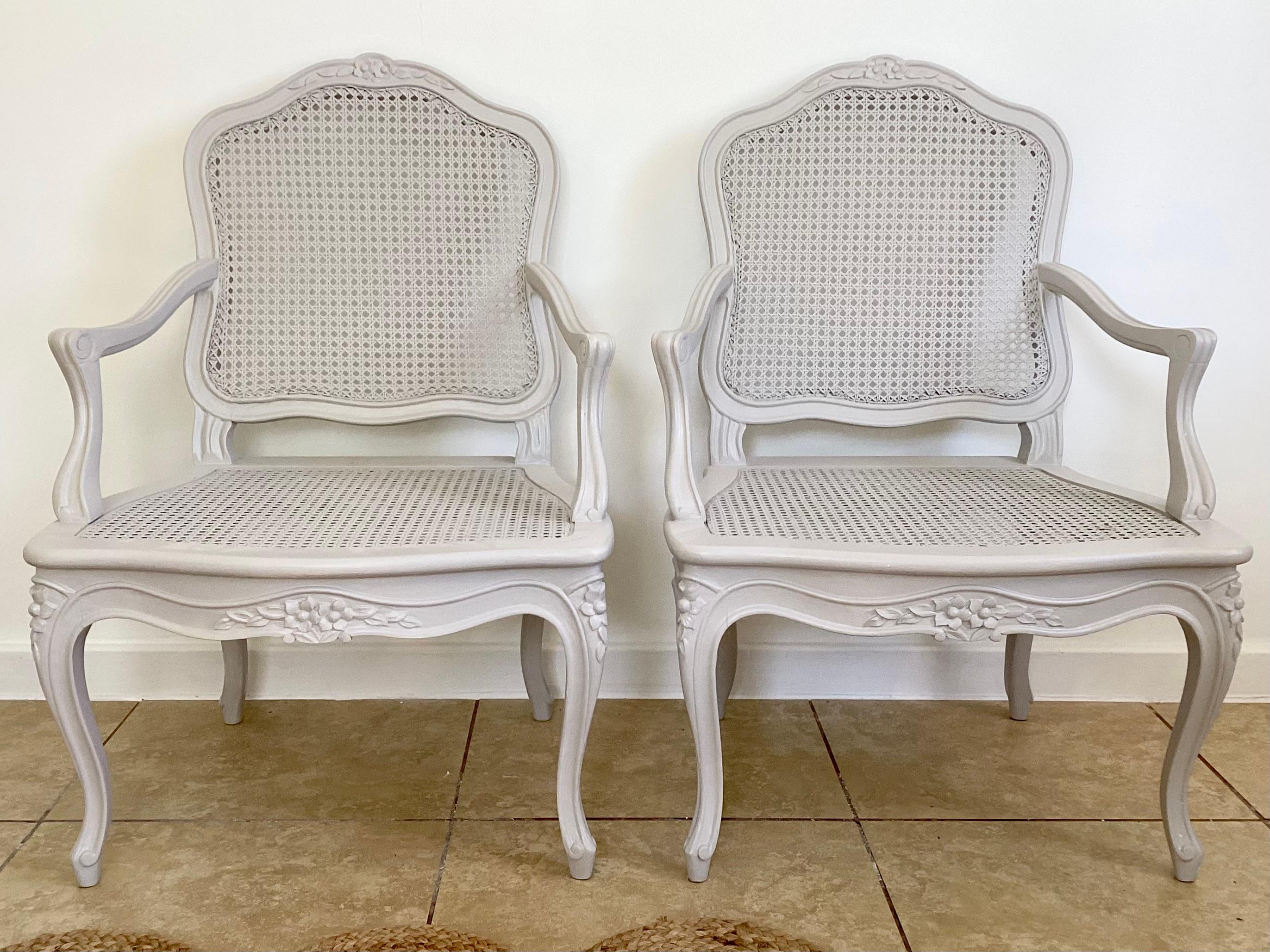 Pair of French Louis XV Fauteuil Guggenheim Collection with caned back and seat freshly lacquered in gray. We have a total of three pairs so collect them all. Add cushions to fit your style or leave as is.