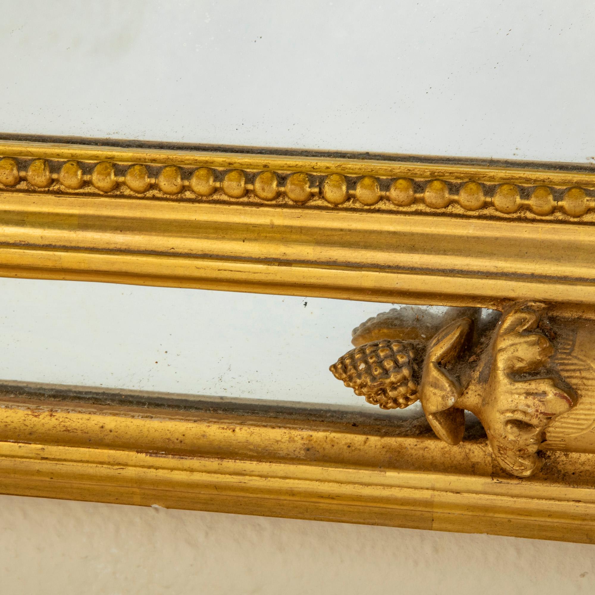 Mid-19th Century French Louis XVI Style Giltwood Mirror with Urn Motif 7