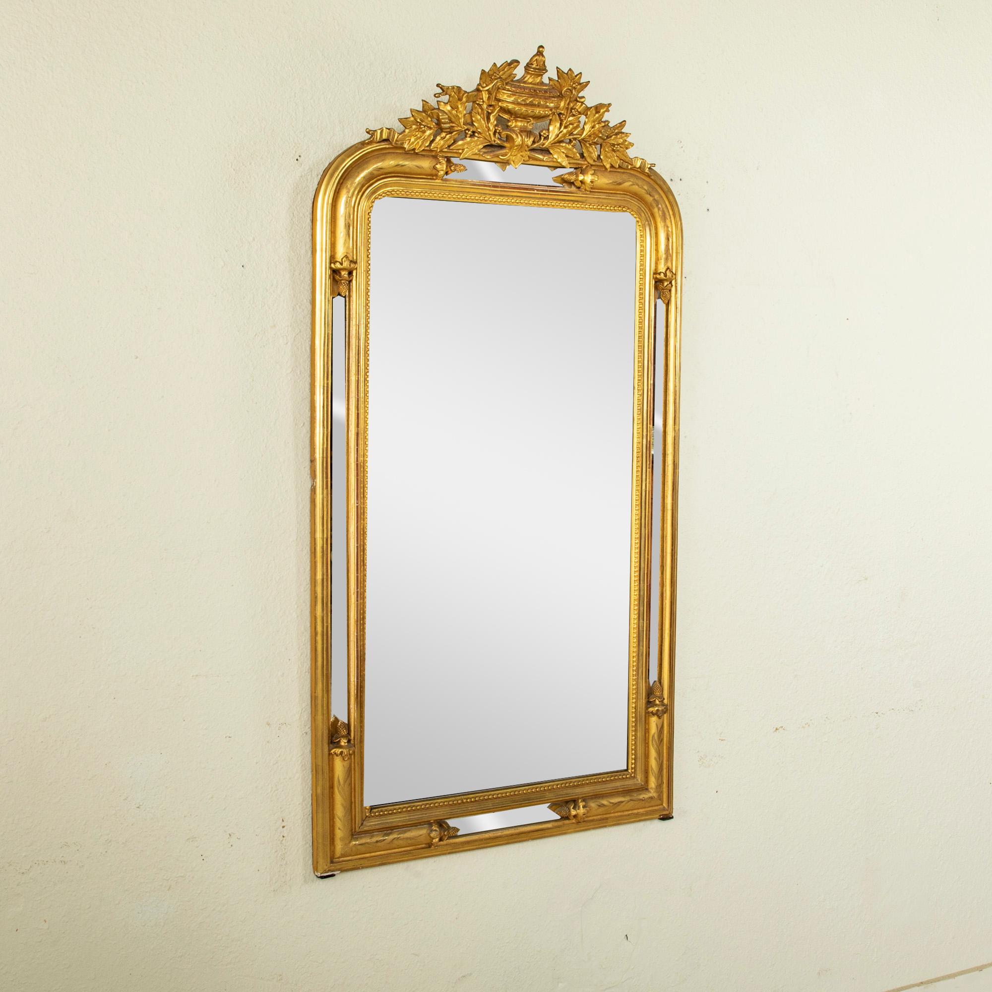 Mid-19th Century French Louis XVI Style Giltwood Mirror with Urn Motif 1