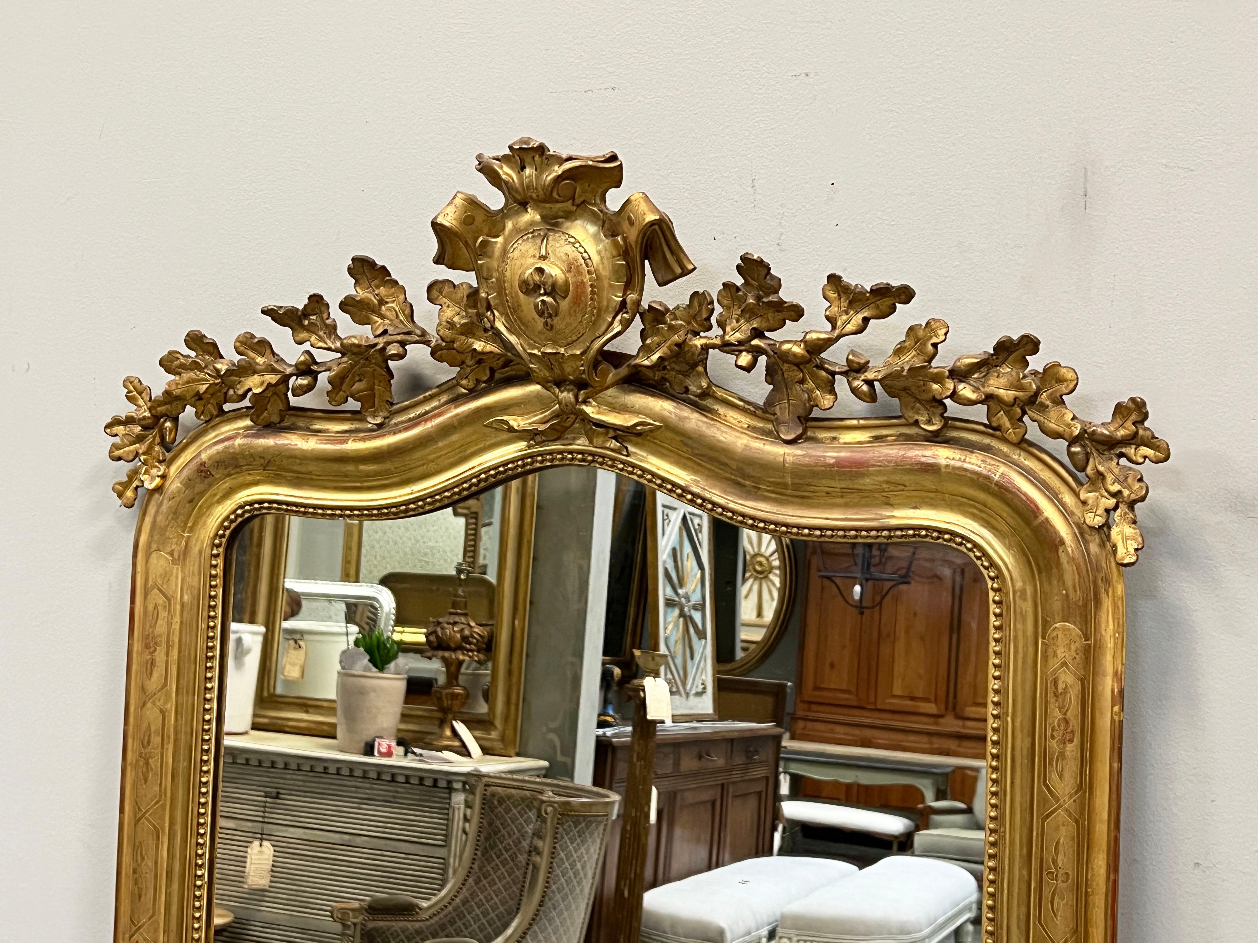 Mid 19th Century French Louis XVI Style Gold Gilt Mirror. Molded gold gilt frame with 