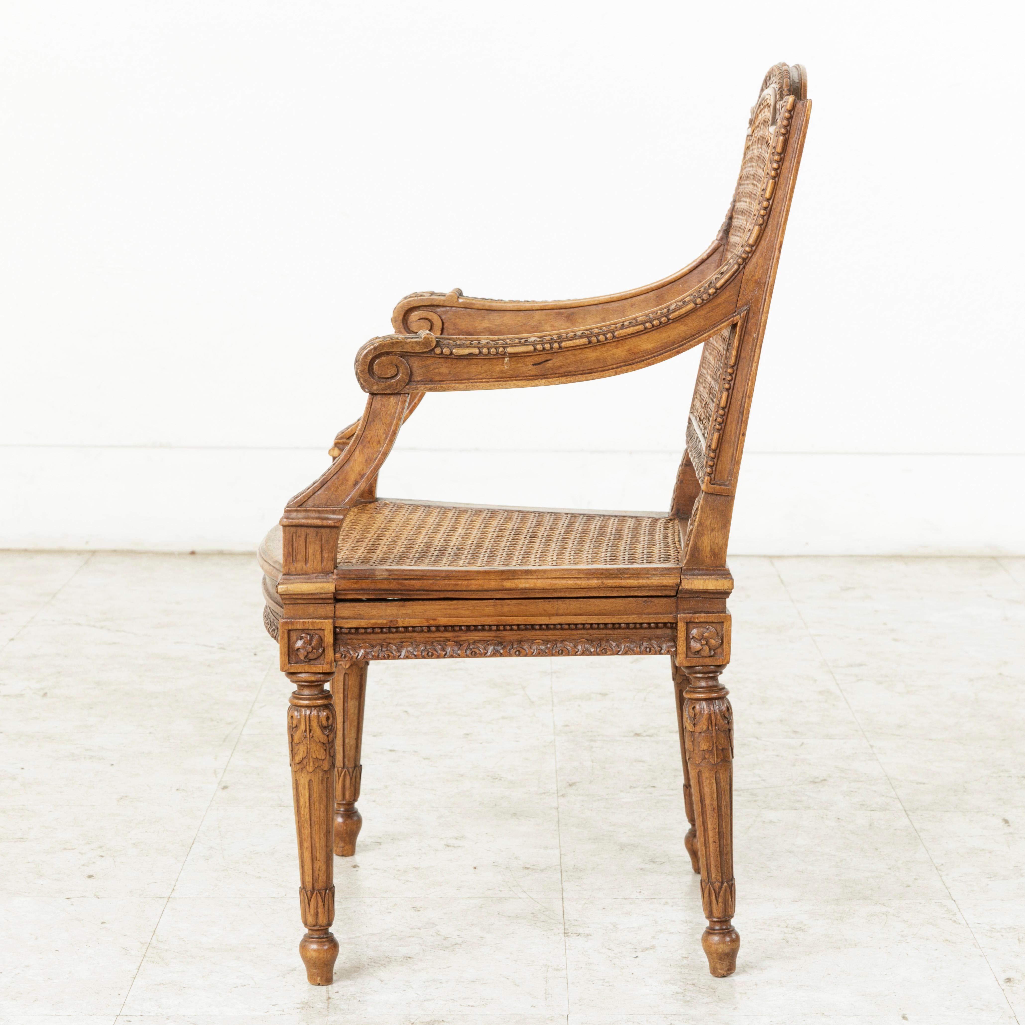 Mid-19th Century French Louis XVI Style Hand Carved Walnut Child's Armchair In Good Condition In Fayetteville, AR