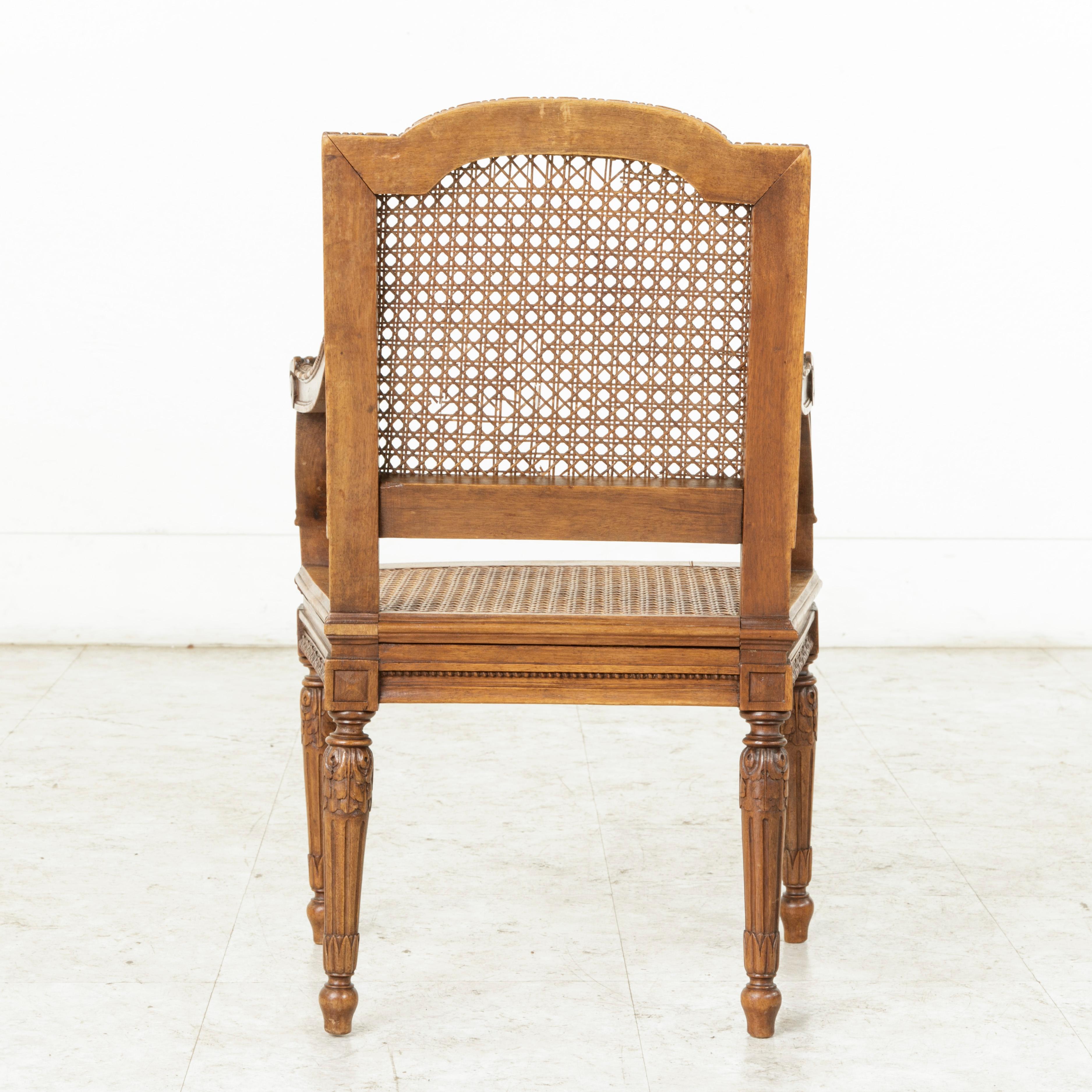 Cane Mid-19th Century French Louis XVI Style Hand Carved Walnut Child's Armchair