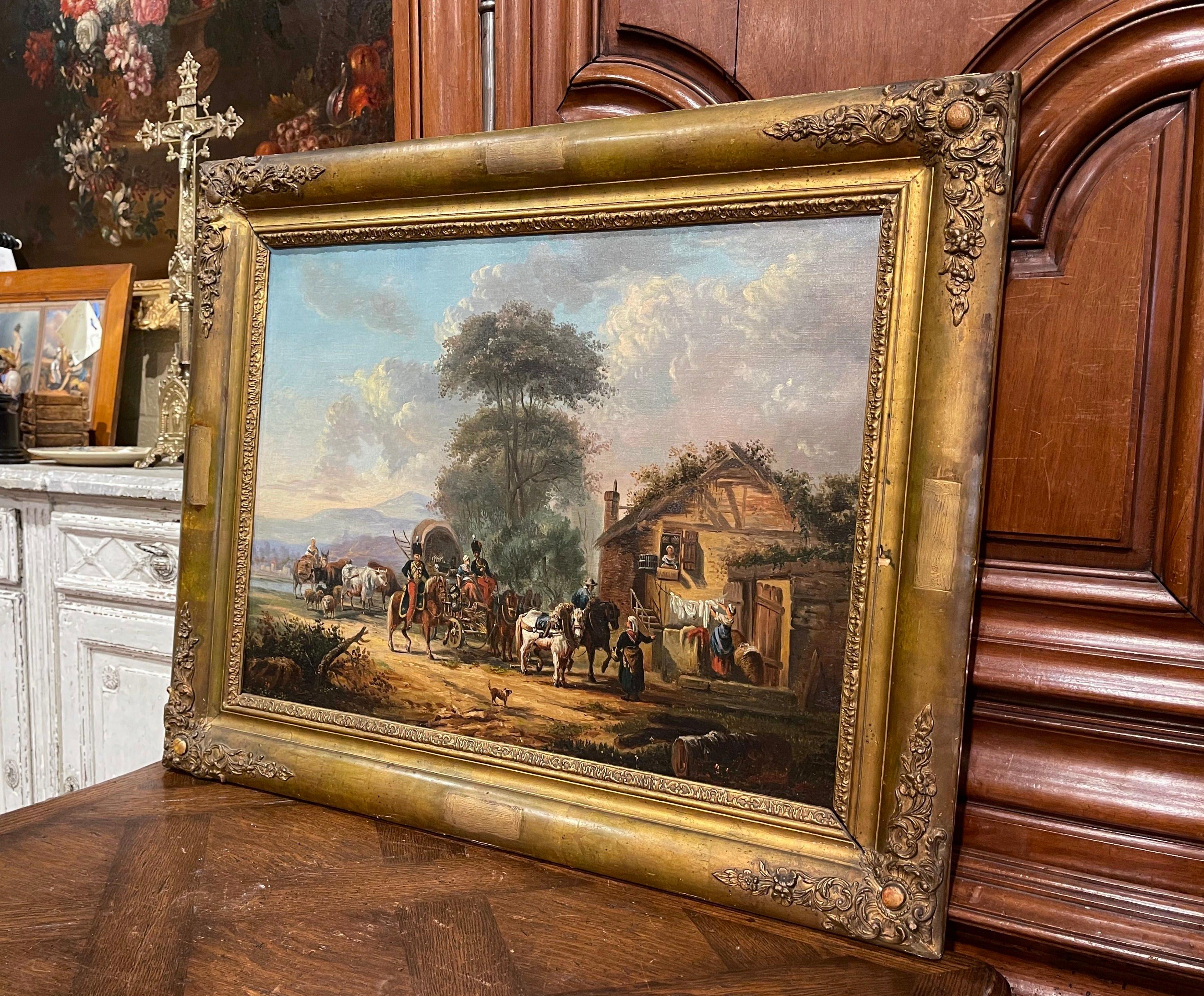 Set in the original carved gilt wood frame and painted in France circa 1860, the antique canvas depicts a pastoral scene with soldiers on horse-drawn carriage stopping in front of a farmhouse. The soldiers are wearing Napoleon III uniforms, and the