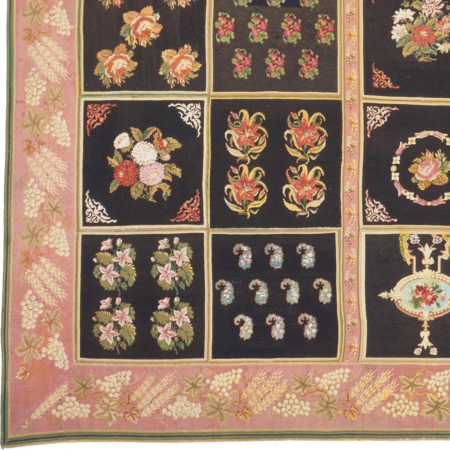 Mid-19th century English needlepoint carpet
England, circa 1870
Composed of 49 panels, each with a dark brown ground & varied floral motifs, enclosed by a liliac border of fruiting vines. Provenance; the Christopher Hodsoll Collection.
  