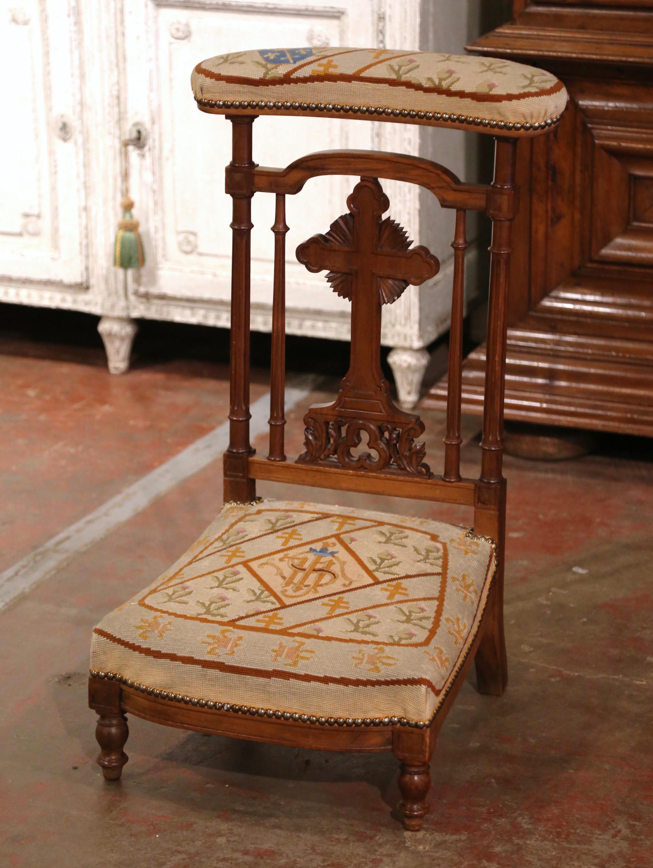 Place this elegant antique prayer chair in your bedroom for daily devotions or your living room or office for a beautiful religious accent. Crafted in France, circa 1870, the traditional kneeler stands on carved feet over a scalloped apron. The back