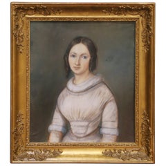 Portrait de jeune femme au pastel français du milieu du 19e siècle dans un cadre en bois doré