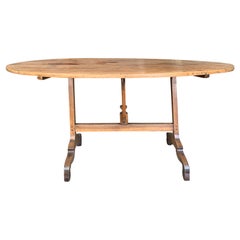 Mid-19th Century French Rustic Oval Wine Tasting Table with Trestle Base