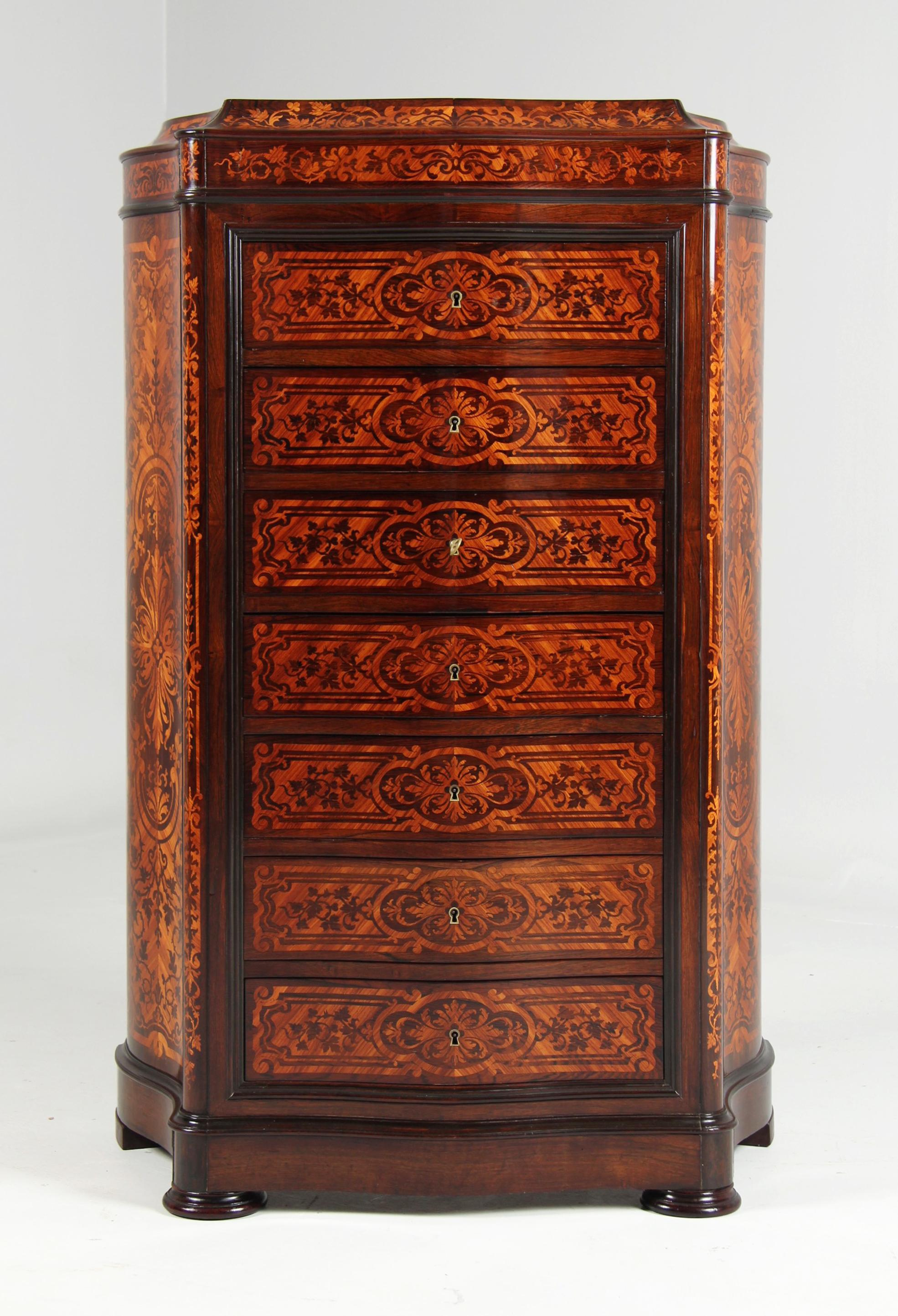Antique pier chest of drawers with secretary compartment - so-called Semainier Galbé

France
Rosewood
circa 1870

Dimensions: H x W x D: 128 x 81 x 42 cm

Description:
Lavishly decorated high chest of drawers from the French Napoleon III period