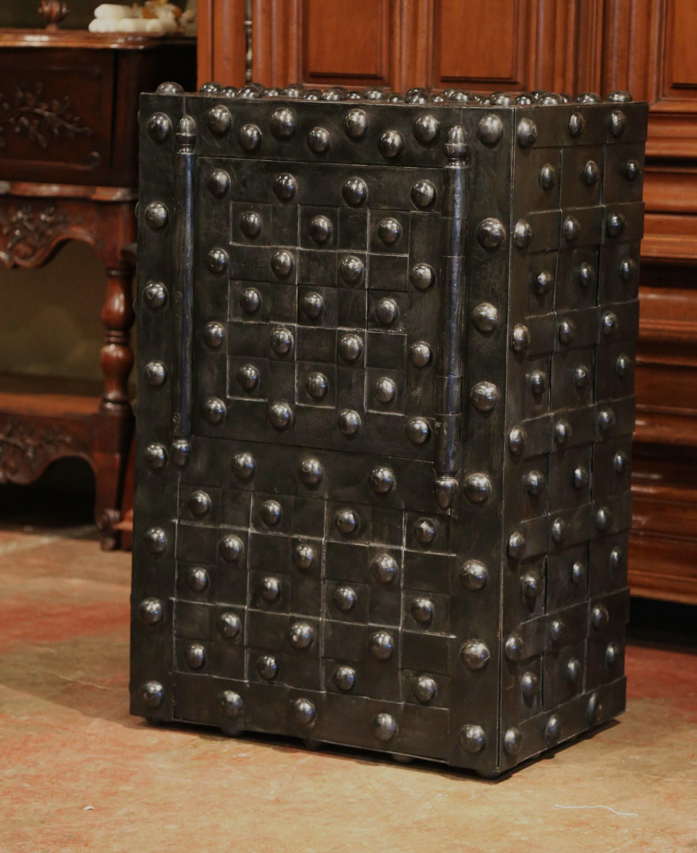 Keep your valuables and important documents in this large antique hobnail safe. Manufactured by Magaud de Charf in Marseilles, France circa 1870, the wrought iron safe is decorated with nail head motifs on all four sides and has an all-original,