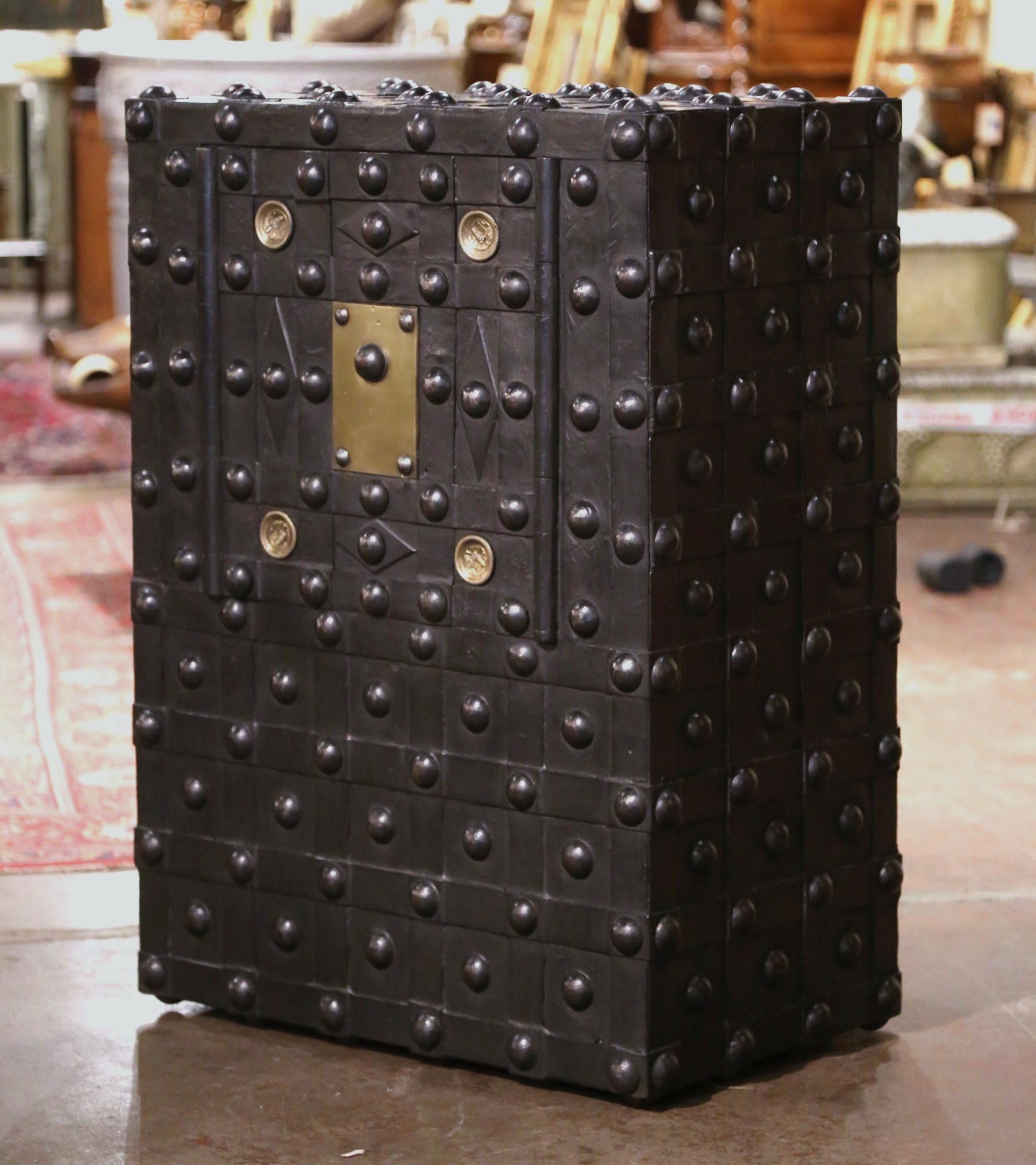 Keep your valuables and important documents in this large antique hobnail safe. Manufactured by Magaud de Charf in Marseilles, France circa 1870, the wrought iron safe is decorated with nail head motifs on all four sides and has an all-original,