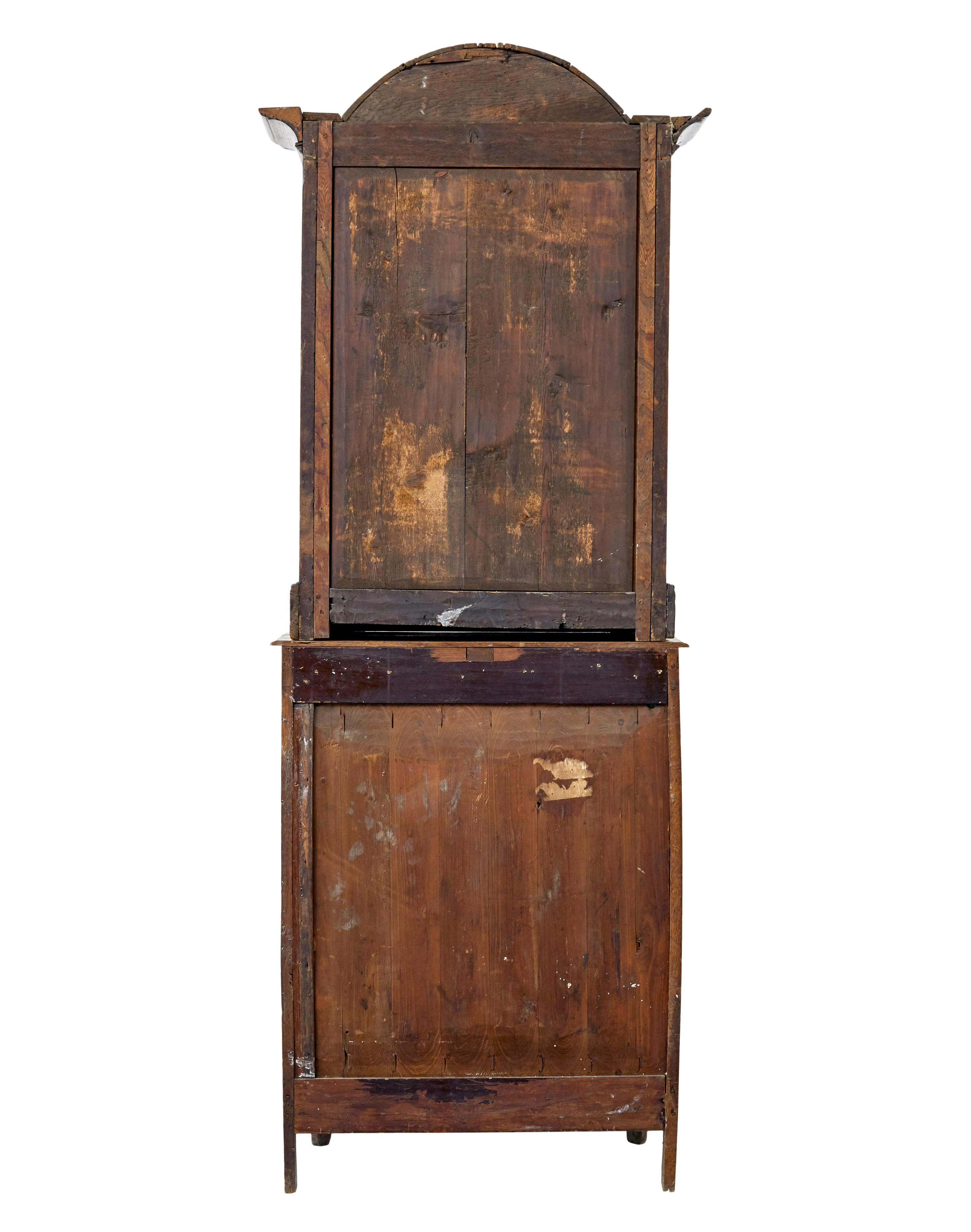 Carved Mid 19th century glazed carved oak liège cabinet For Sale