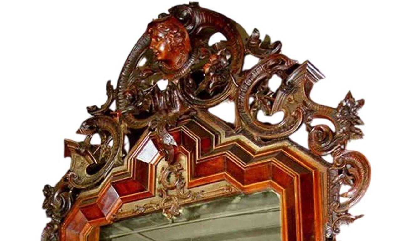 Magnificent mid-19th century Italian console with mirror, masterfully hand-carved and richly detailed. The console features a high-quality solid wood frame adorned with finely sculpted male heads in classical armor on the legs, representing strength