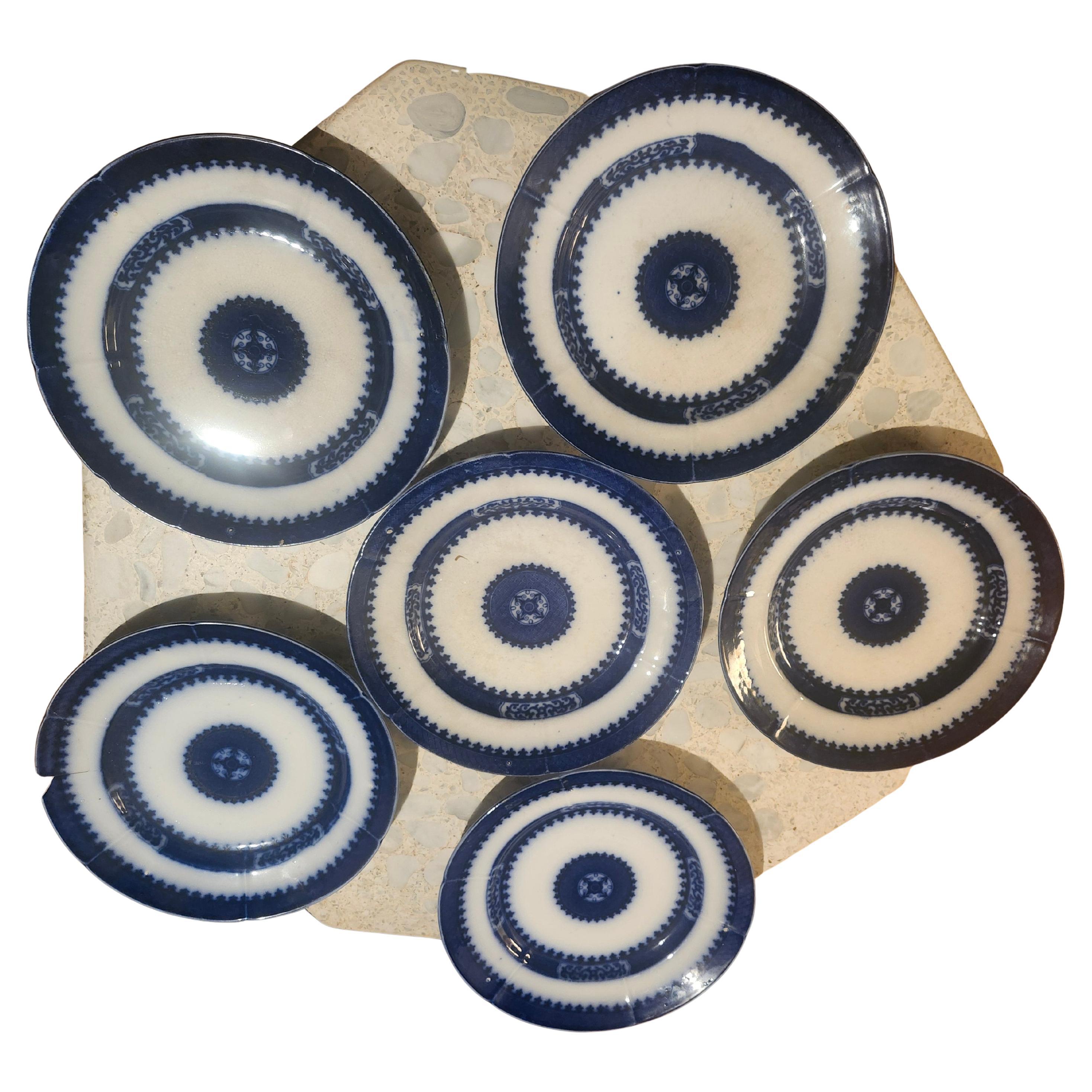 Mitte des 19. Jahrhunderts Hand Crafted Flow Blue Ironstone Satz 9 tief Mittagessen Teller Nankin (Chinesischer Export) im Angebot