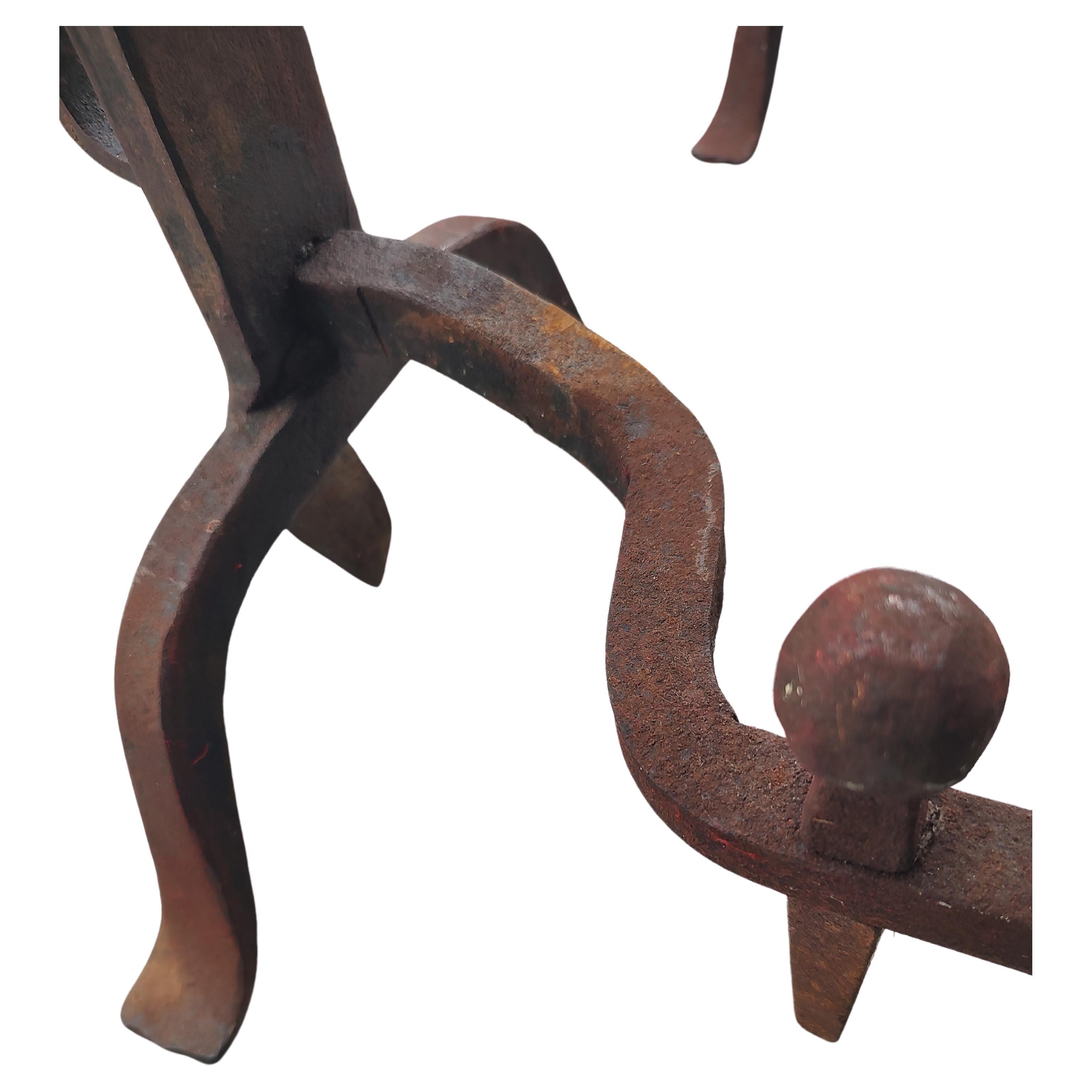 Fantastic pair of Mid 19th century iron with cast brass mushroom top finials. Great patina and age related wear. Tall, 29 h and deep 20.5 they have a commanding presence with a great antique look. 