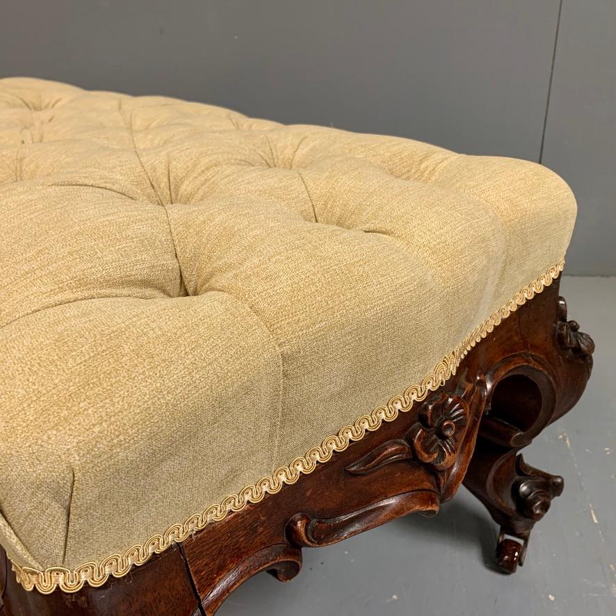 This is a very fine quality mid-19th century Irish solid carved mahogany buttoned long stool or footstool, fully restored and fully re upholstered.
Made by a well know and very well respected craftsman, named Strahan and based in Dublin. The frame