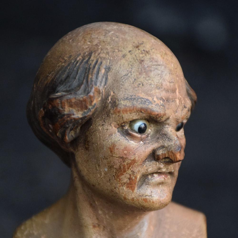 Mid-19th century crib figure bust
A wonderful example of a mid-19th century Italian hand carved crib figure bust. Glass eyes and original paint still intact. This artifact is mounted to a bespoke velour base, the bust is removeable, this item has a